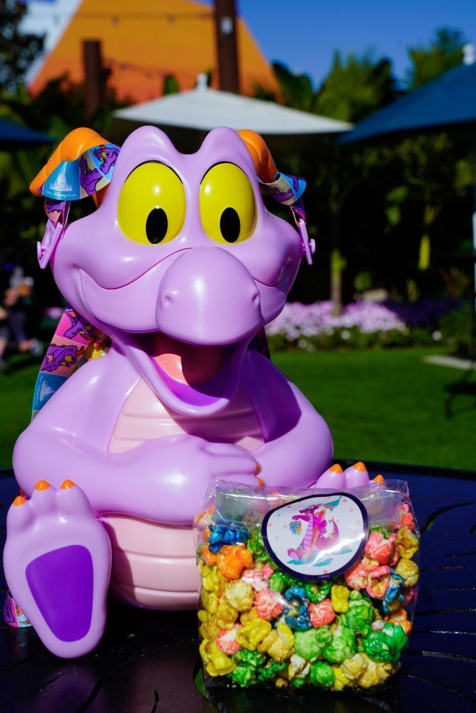 A Figment-shaped popcorn bucket at Epcot.