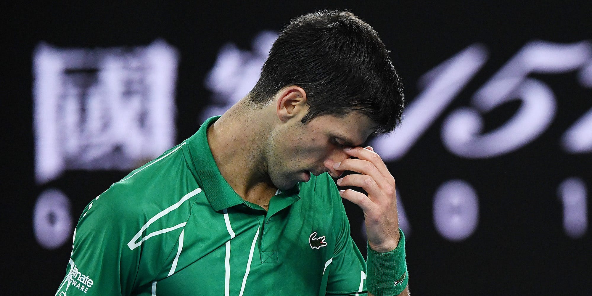 Novak Djokovic of Serbia reacts during his Men's Singles Final match against Dominic Thiem of Austria on day fourteen of the 2020 Australian Open at Melbourne Park