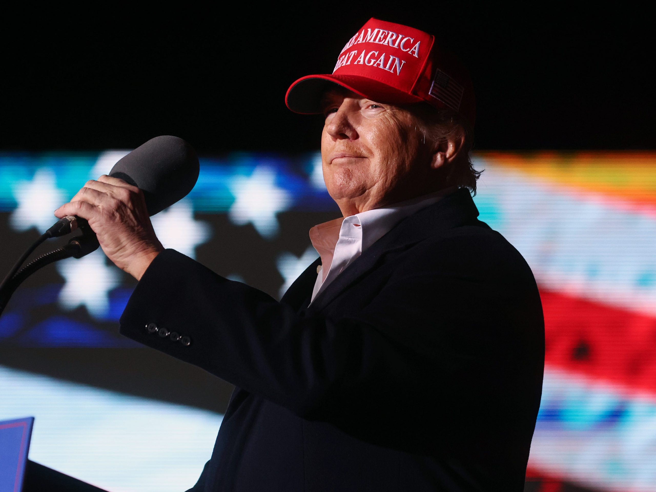 Former President Donald Trump prepares to speak at a rally at the Canyon Moon Ranch festival grounds on January 15, 2022 in Florence, Arizona.