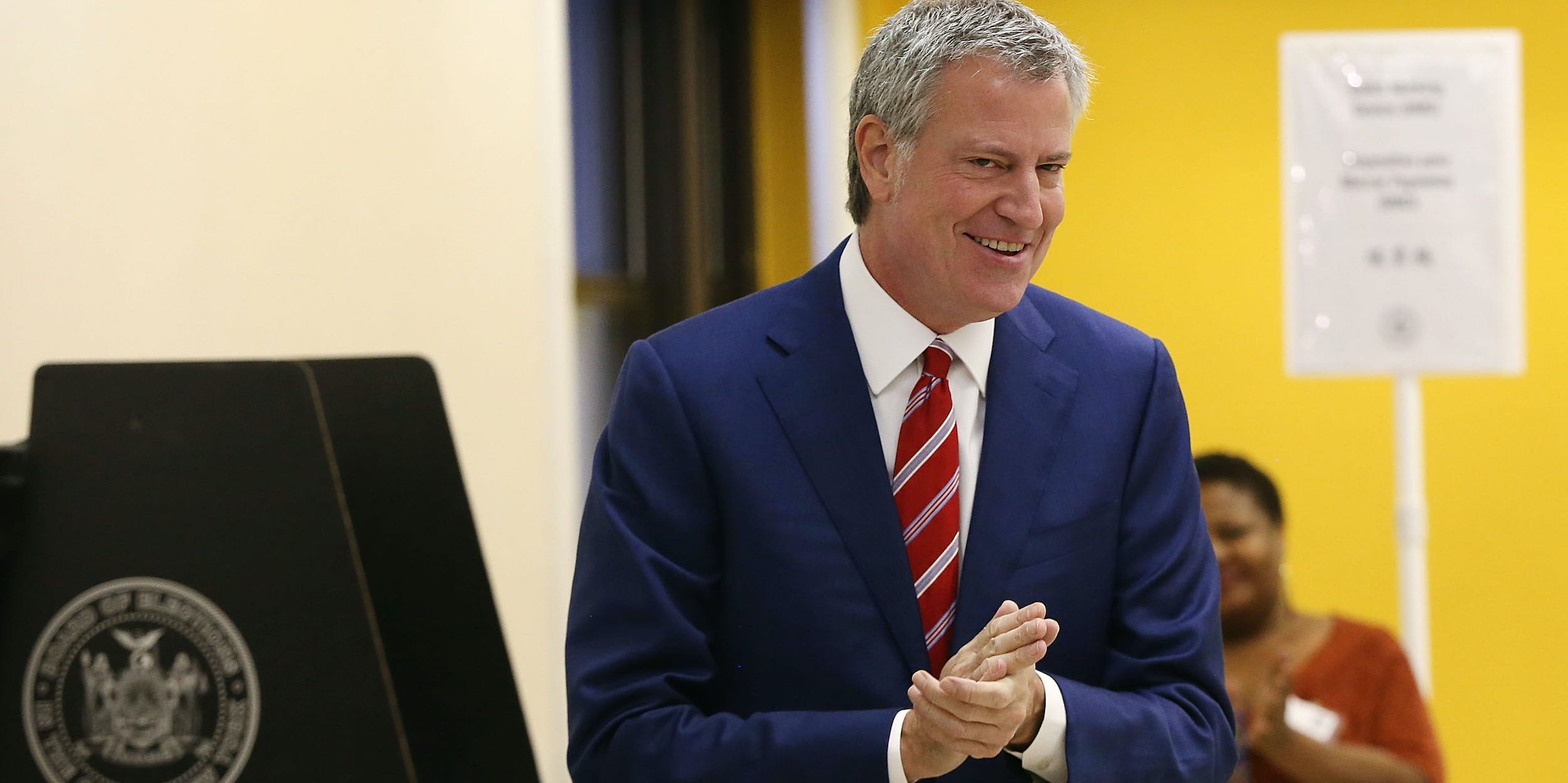 Former New York City Mayor Bill de Blasio at a voting booth.