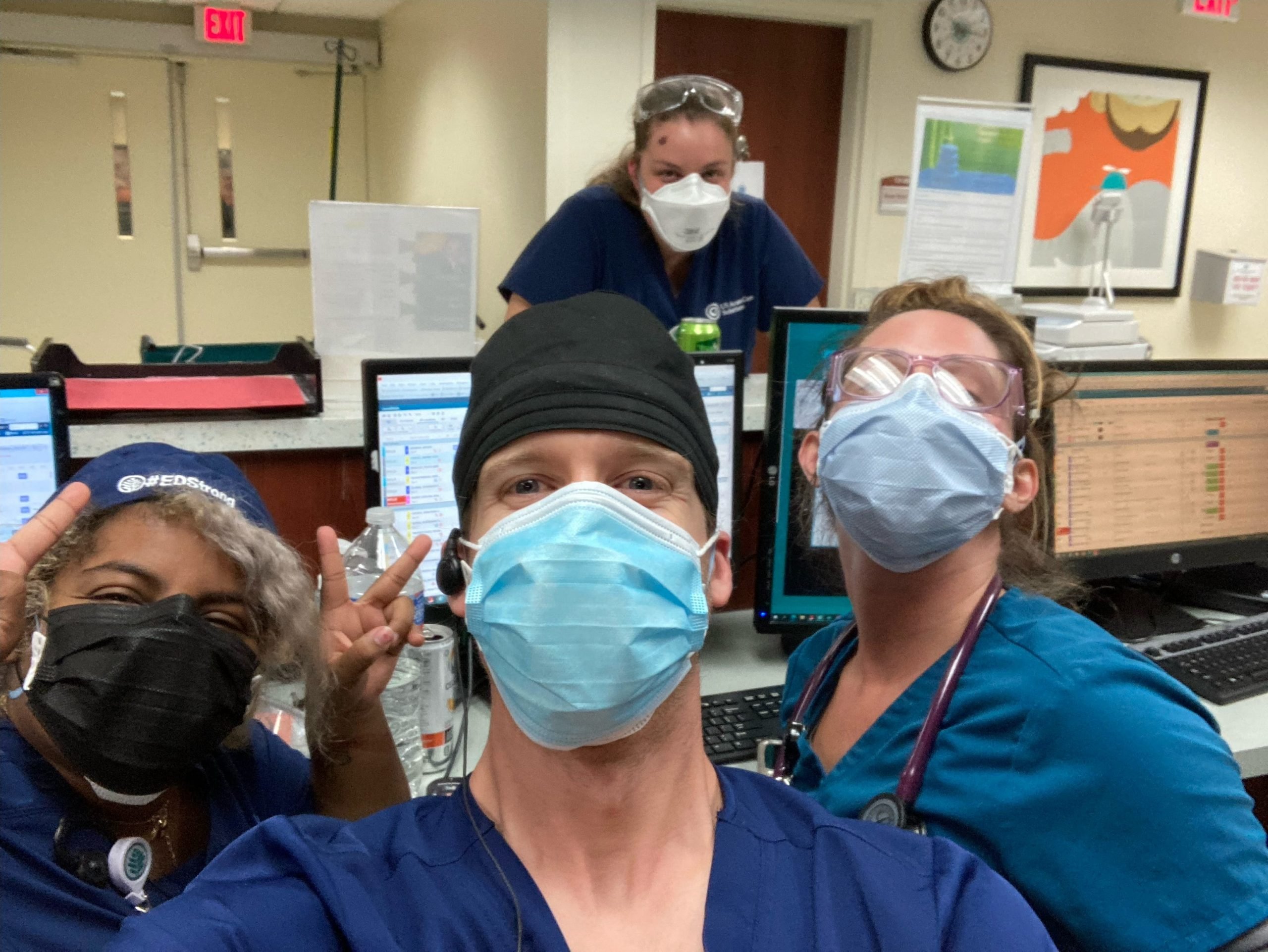 Thad Cummings with colleagues at the hospital.