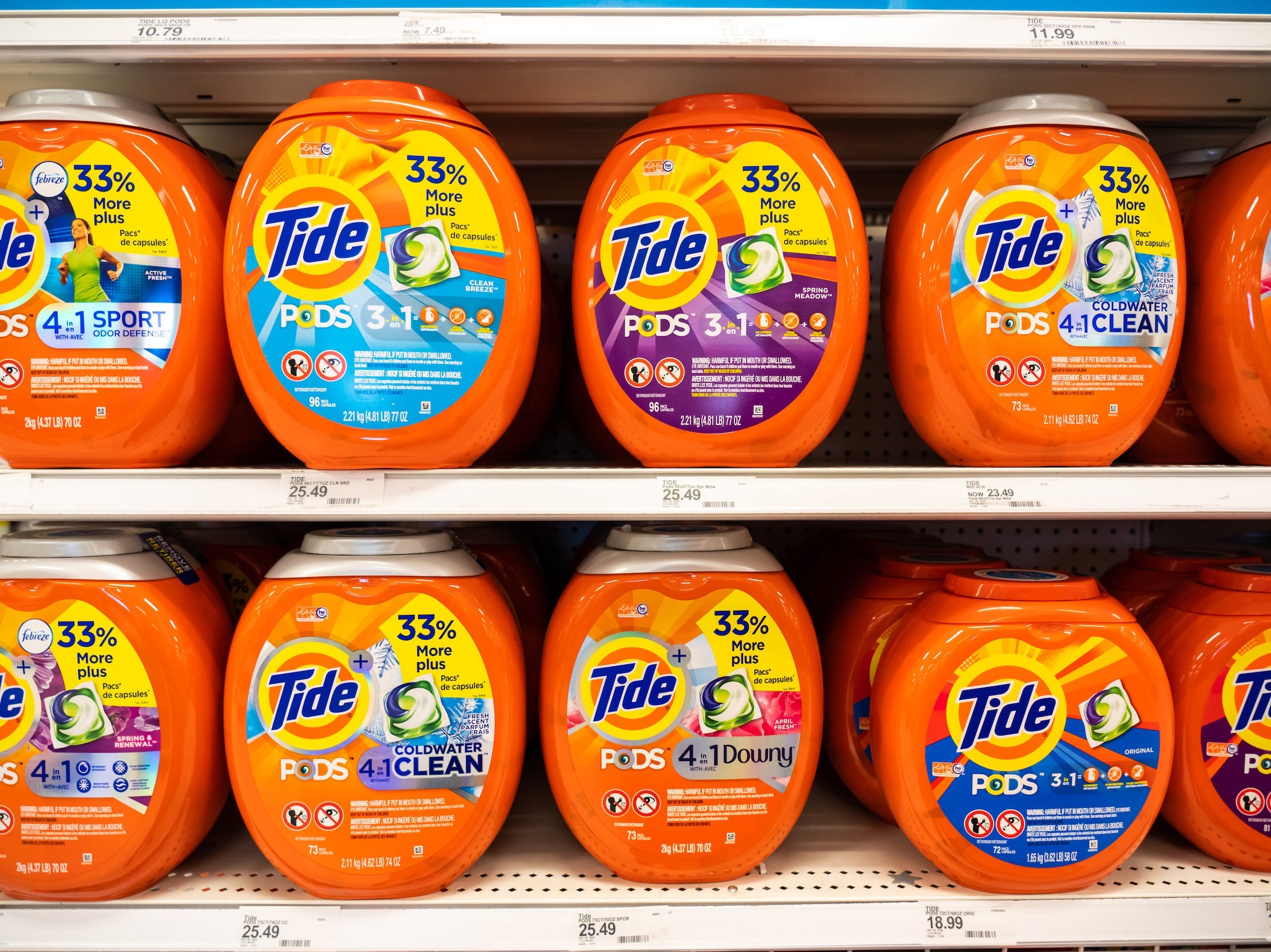 Tide pods containers on shelf in supermarket