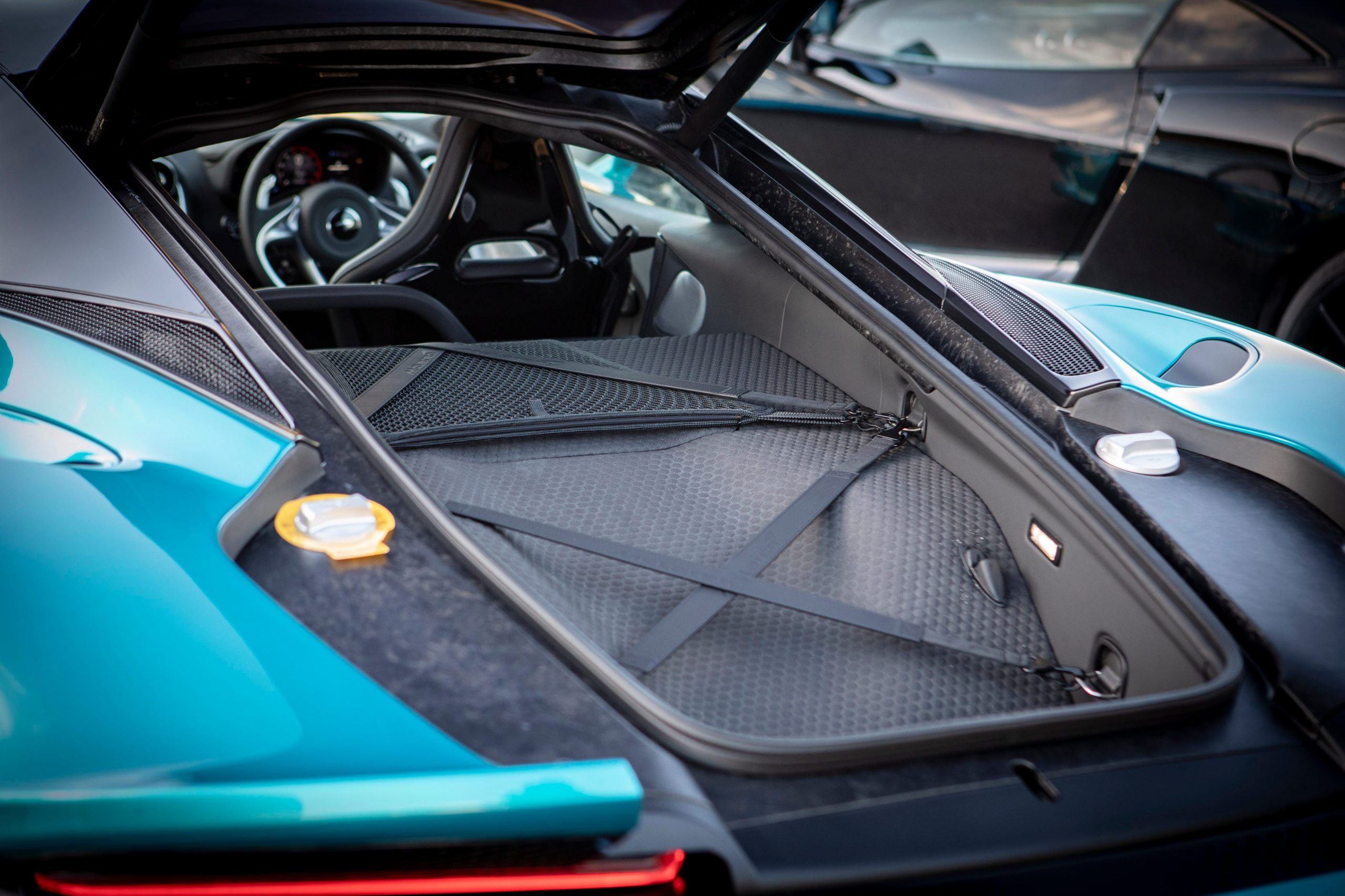 A blue McLaren GT.