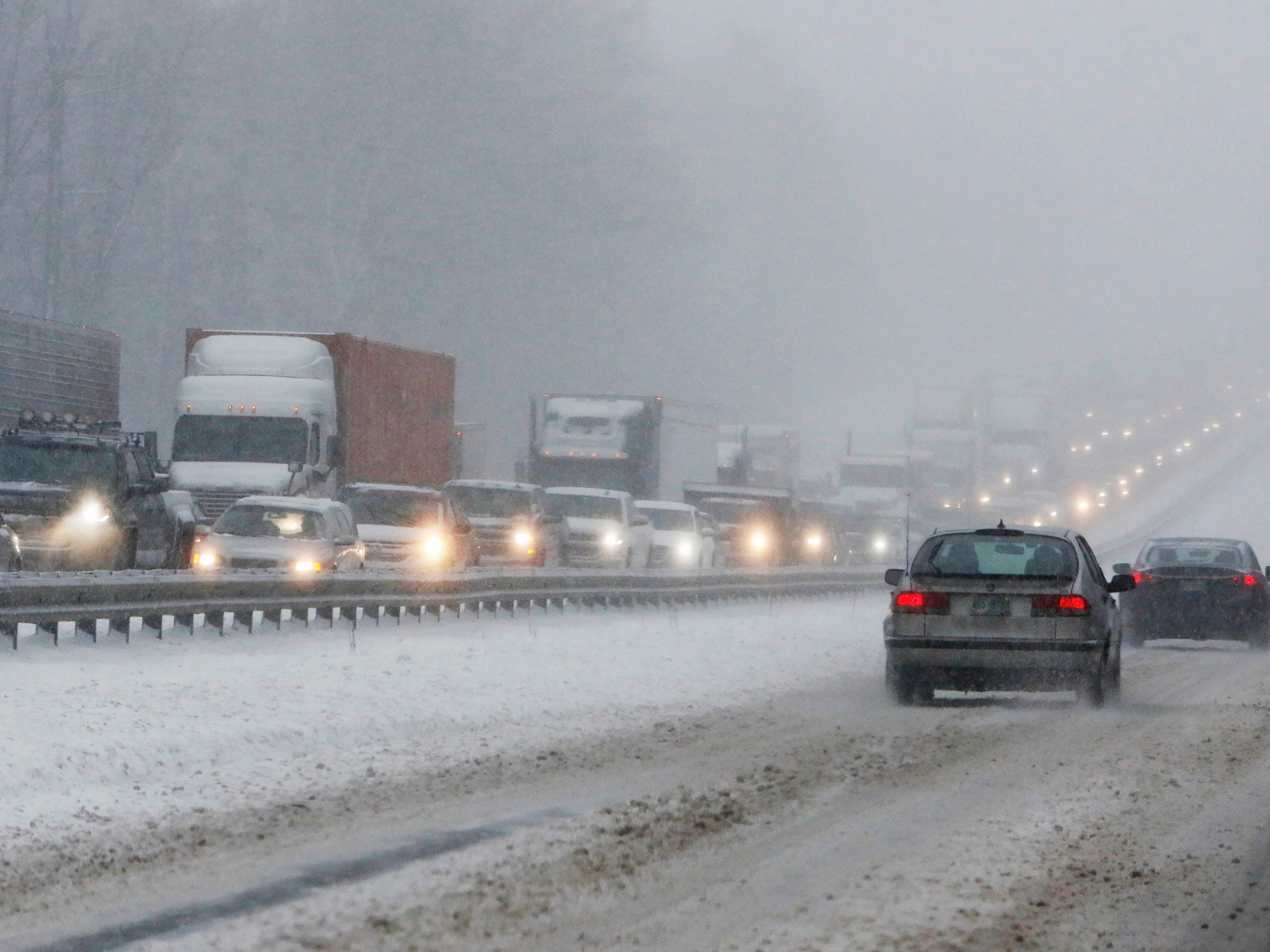 Northbound traffic on I-95 is at a standstill following a tractor trailer that jack-knived in the snowstorm.