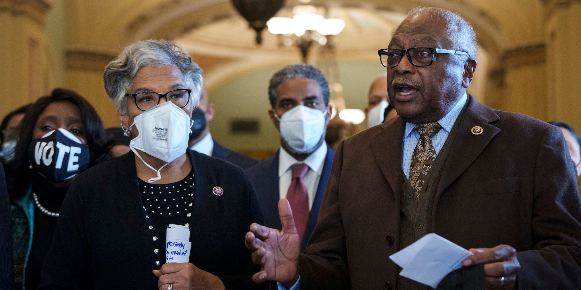 Standing with members of the Congressional Black Caucus, caucus chair Rep. Joyce Beatty (D-OH) and Rep. James Clyburn (D-SC) speak to reporters about voting rights outside of the Senate Chamber at the U.S. Capitol on January 19, 2022 in Washington, DC