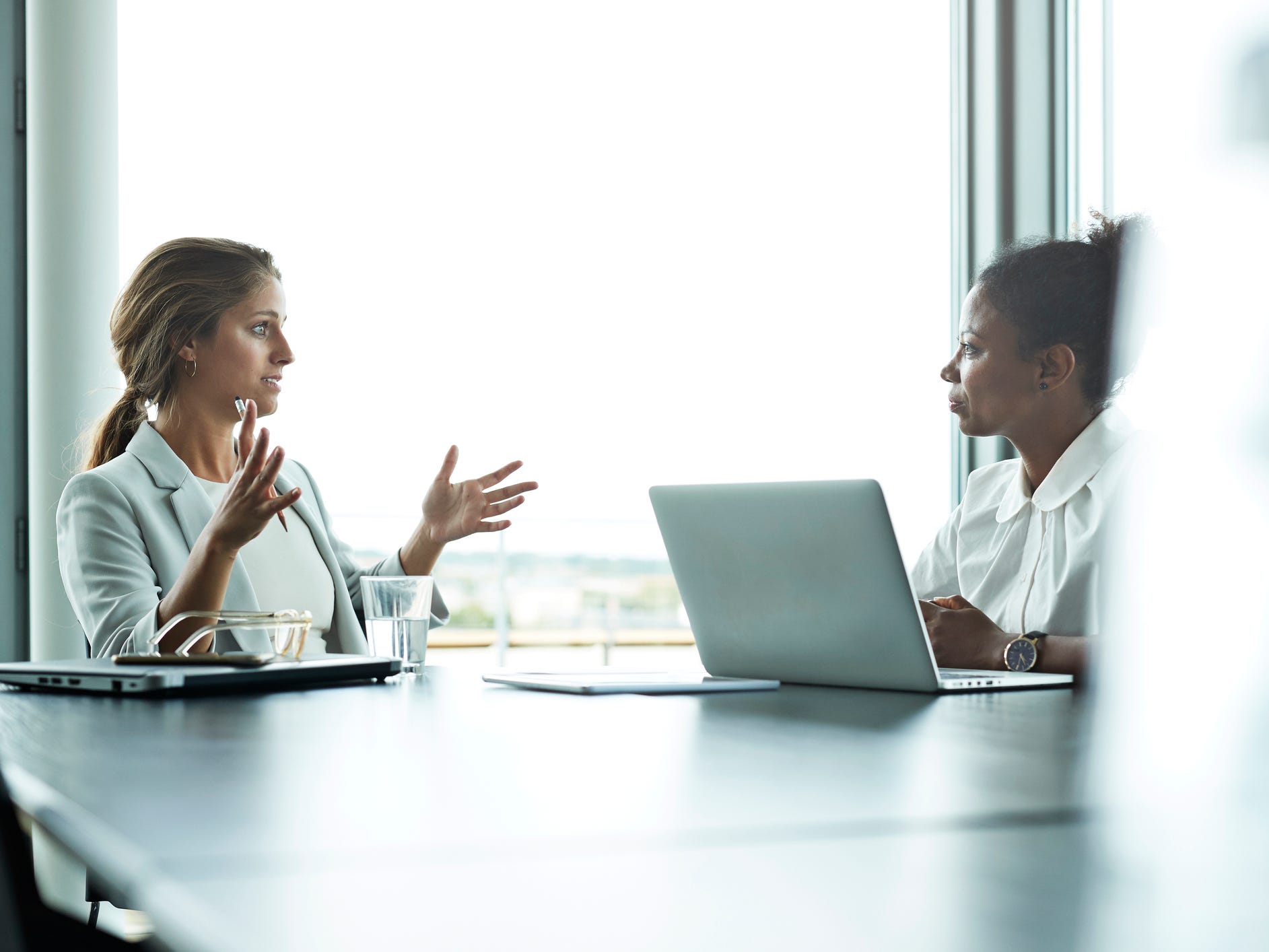 Businesswomen having meeting in boardroom