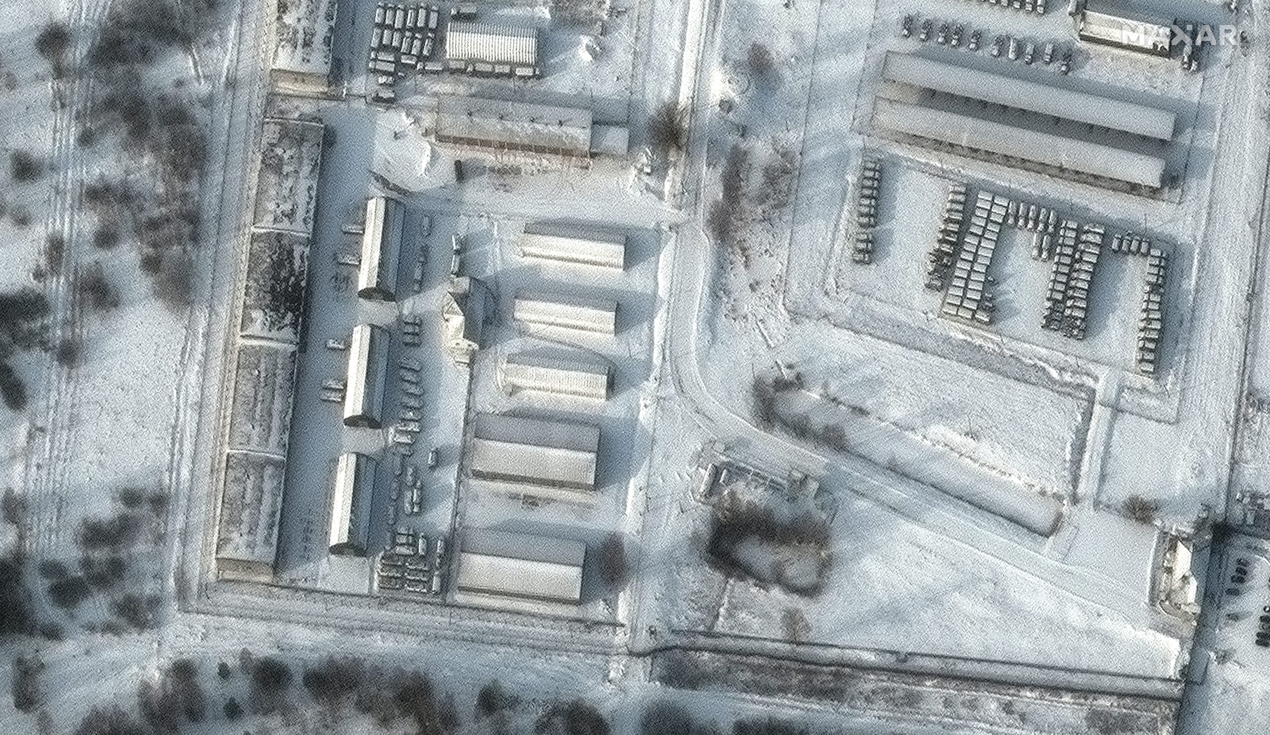 View of armored personnel carriers and trucks at facility in Klimovo, Russia, about 8 miles from the border with Ukraine, on Jan. 19, 2022.