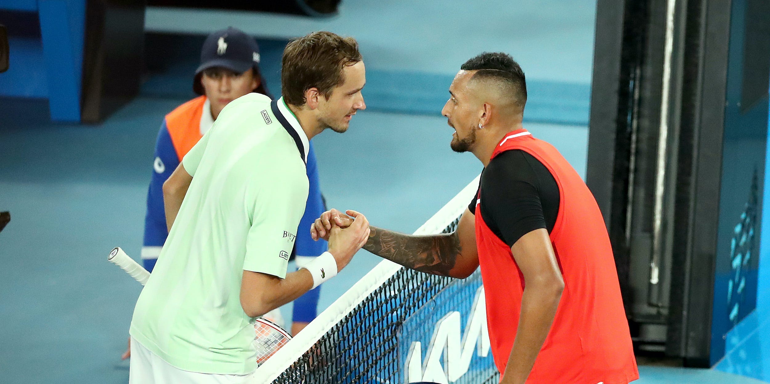Daniil Medvedev and Nick Kyrgios shake hands after their match at the 2022 Australian Open.