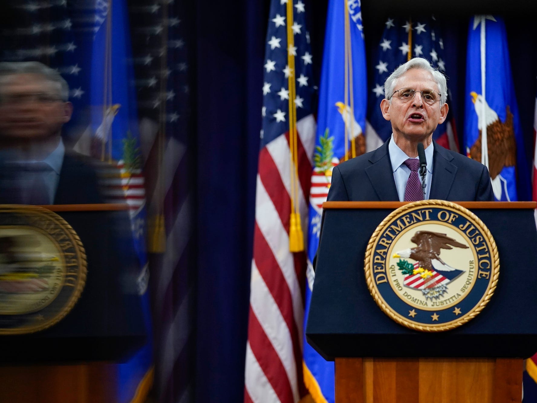 Attorney General Merrick Garland speaking at the Justice Department a day before the January 6, 2021, anniversary.