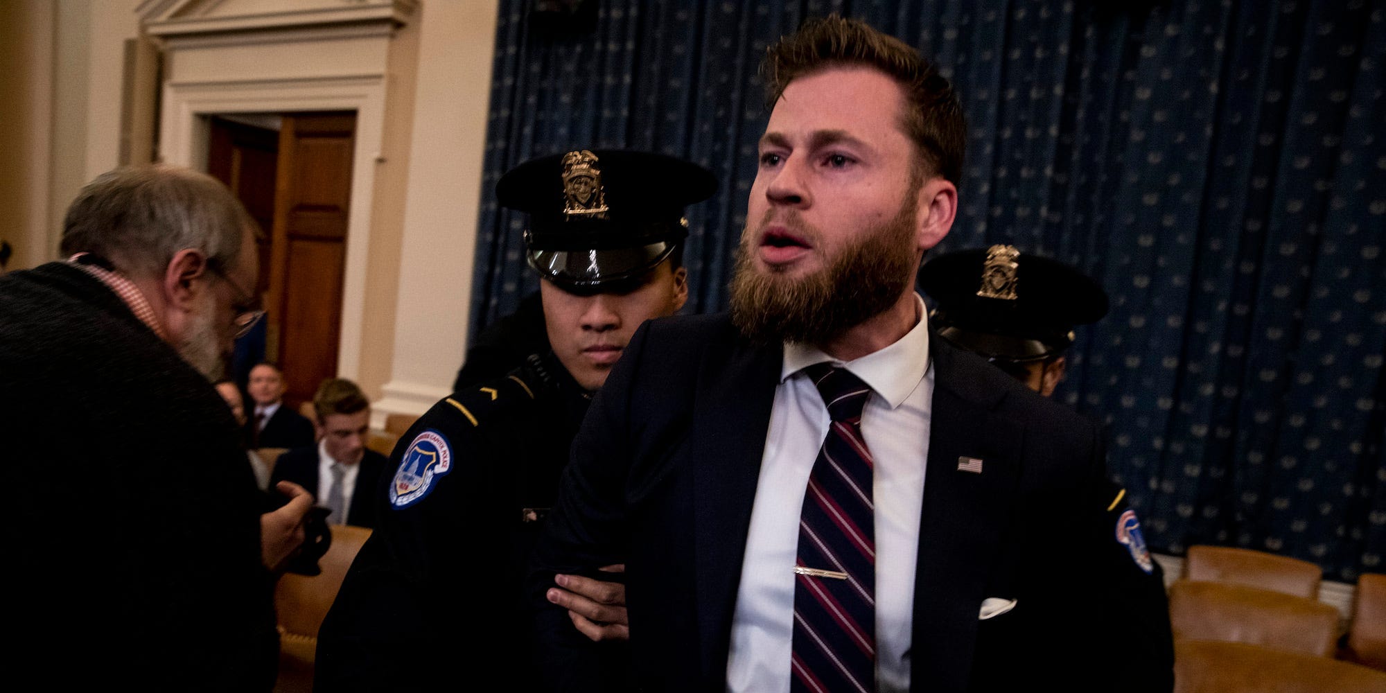 Owen Shroyer from InfoWars is removed from a public impeachment inquiry hearing with the House Judiciary Committee in the Longworth House Office Building on Capitol Hill December 9, 2019 in Washington, DC.