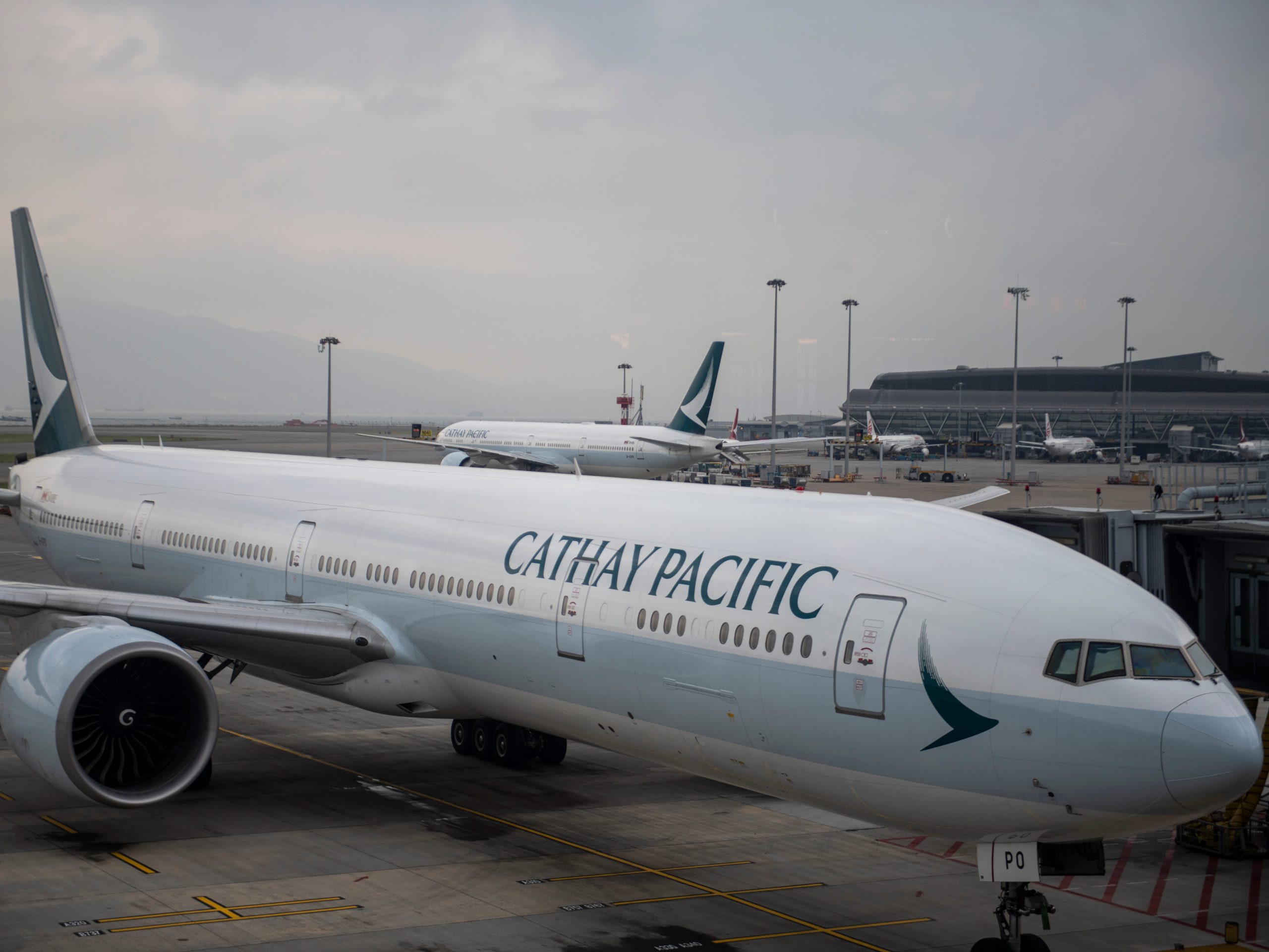 A plane belonging to the Hong Kong Airline Carrier Cathay Pacific is seen parked in Hong Kong International Airport in Hong Kong, China on 23 May 2019.