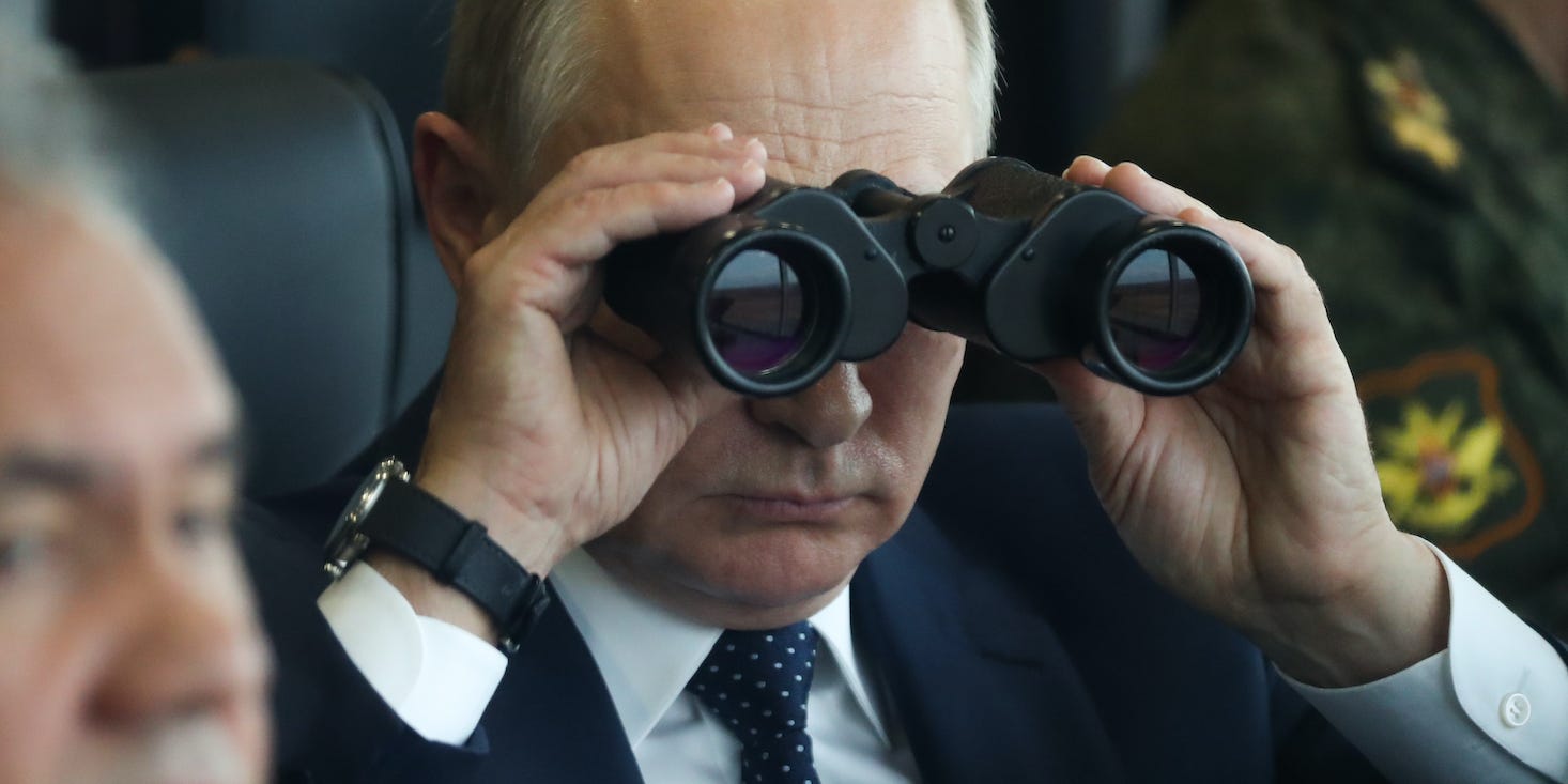 Putin observes the Zapad 2021 military exercises through binoculars.
