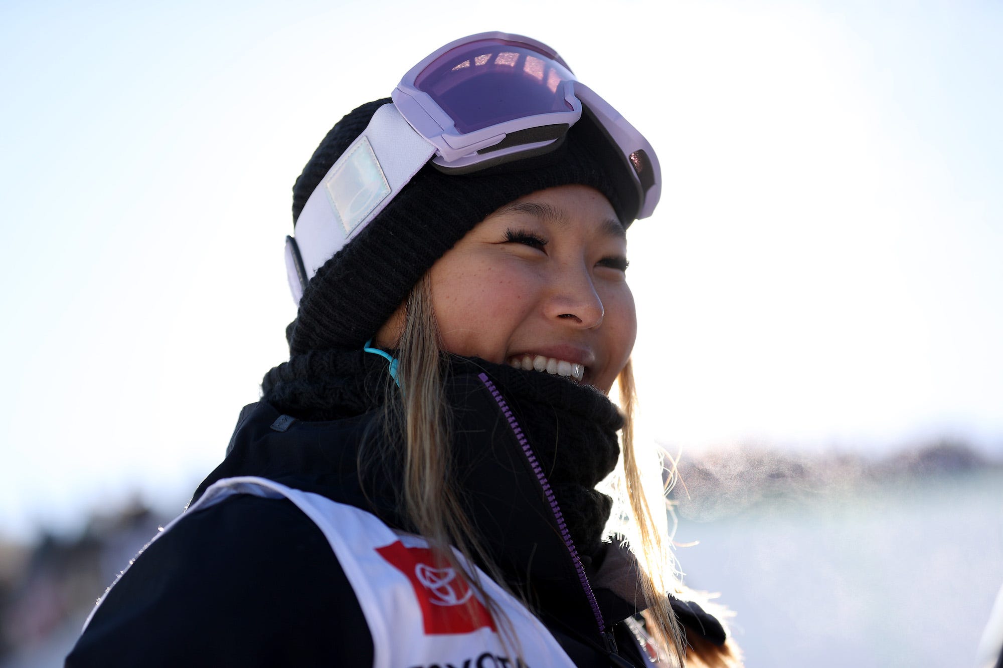 Chloe Kim smiles during a competition in 2021.