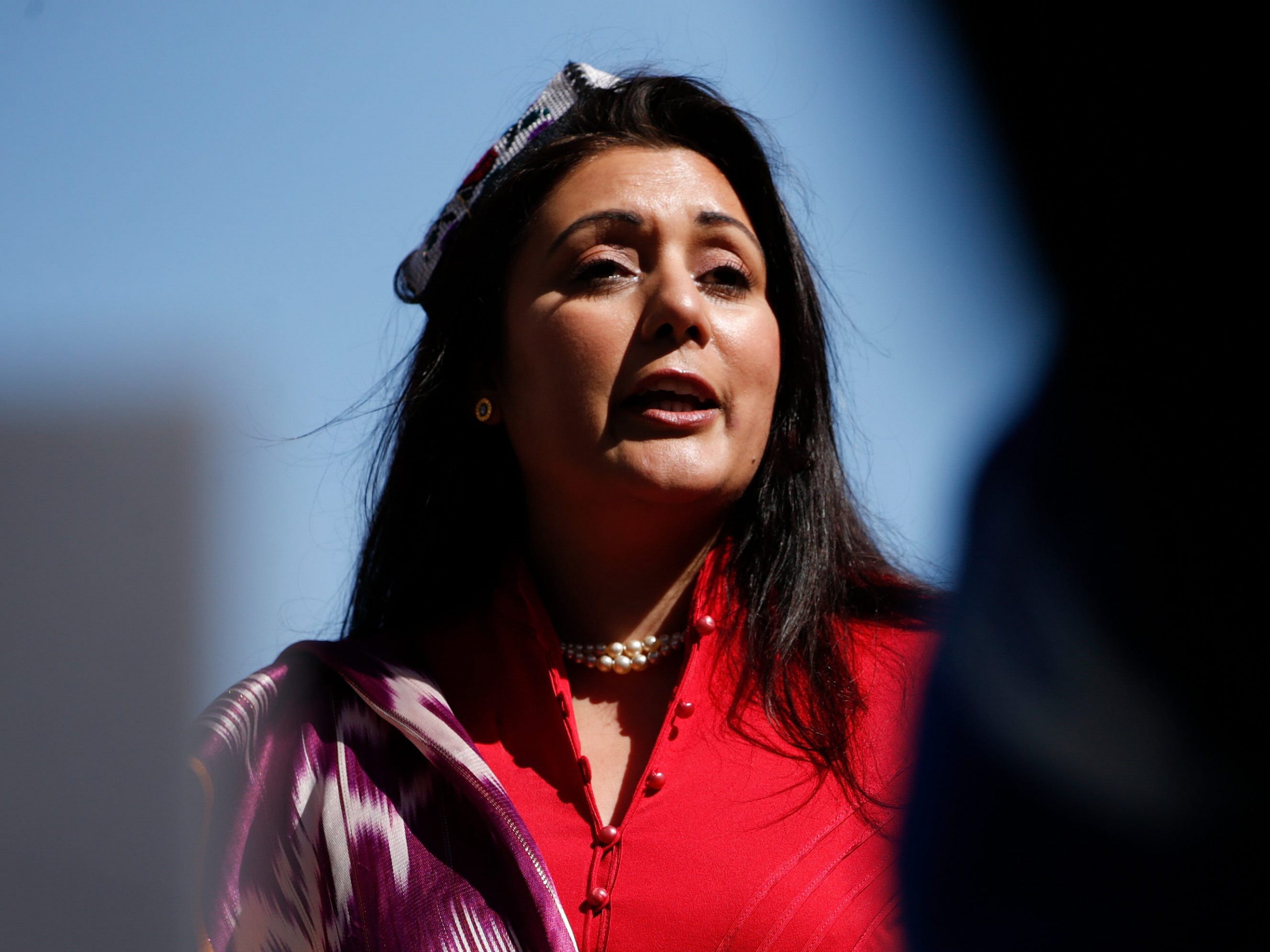 Conservative Party MP Nusrat Ghani addresses members of the Uighur community and human rights activists demonstrating outside the Houses of Parliament in London, United Kingdom on April 22, 2021