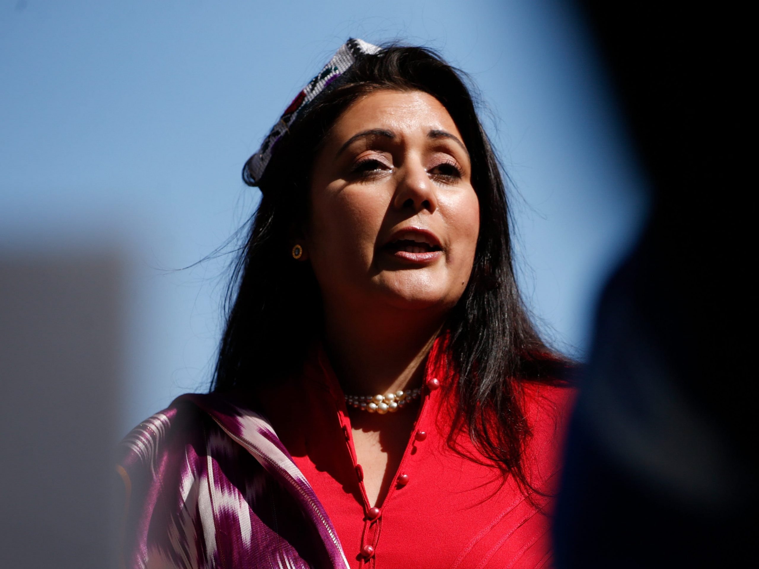 Conservative Party MP Nusrat Ghani addresses members of the Uighur community and human rights activists demonstrating outside the Houses of Parliament in London, United Kingdom on April 22, 2021