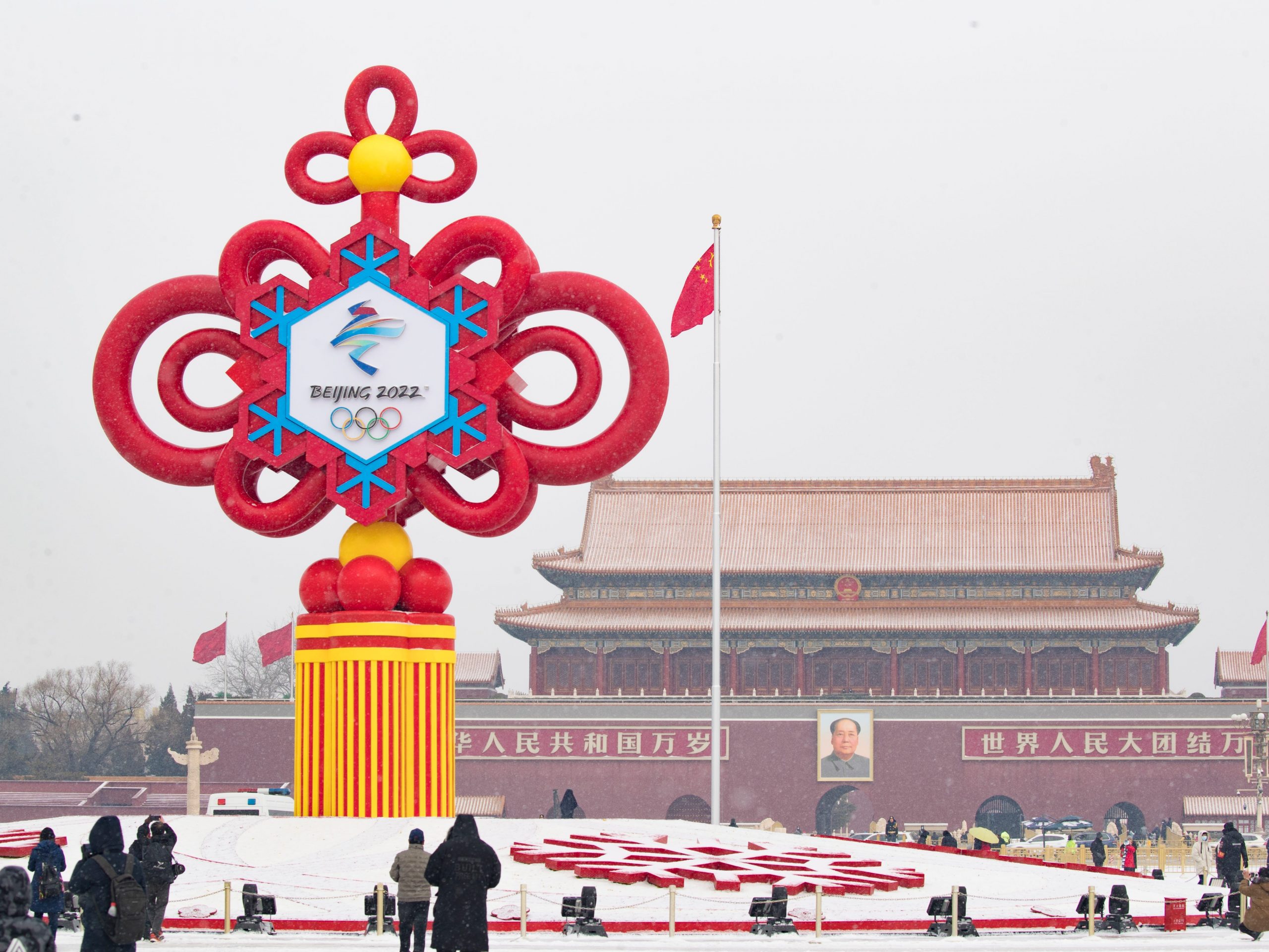 Winter Olympics-themed Chinese knot is seen at Tian'anmen Square on a snowy day on January 20, 2022 in Beijing, China.