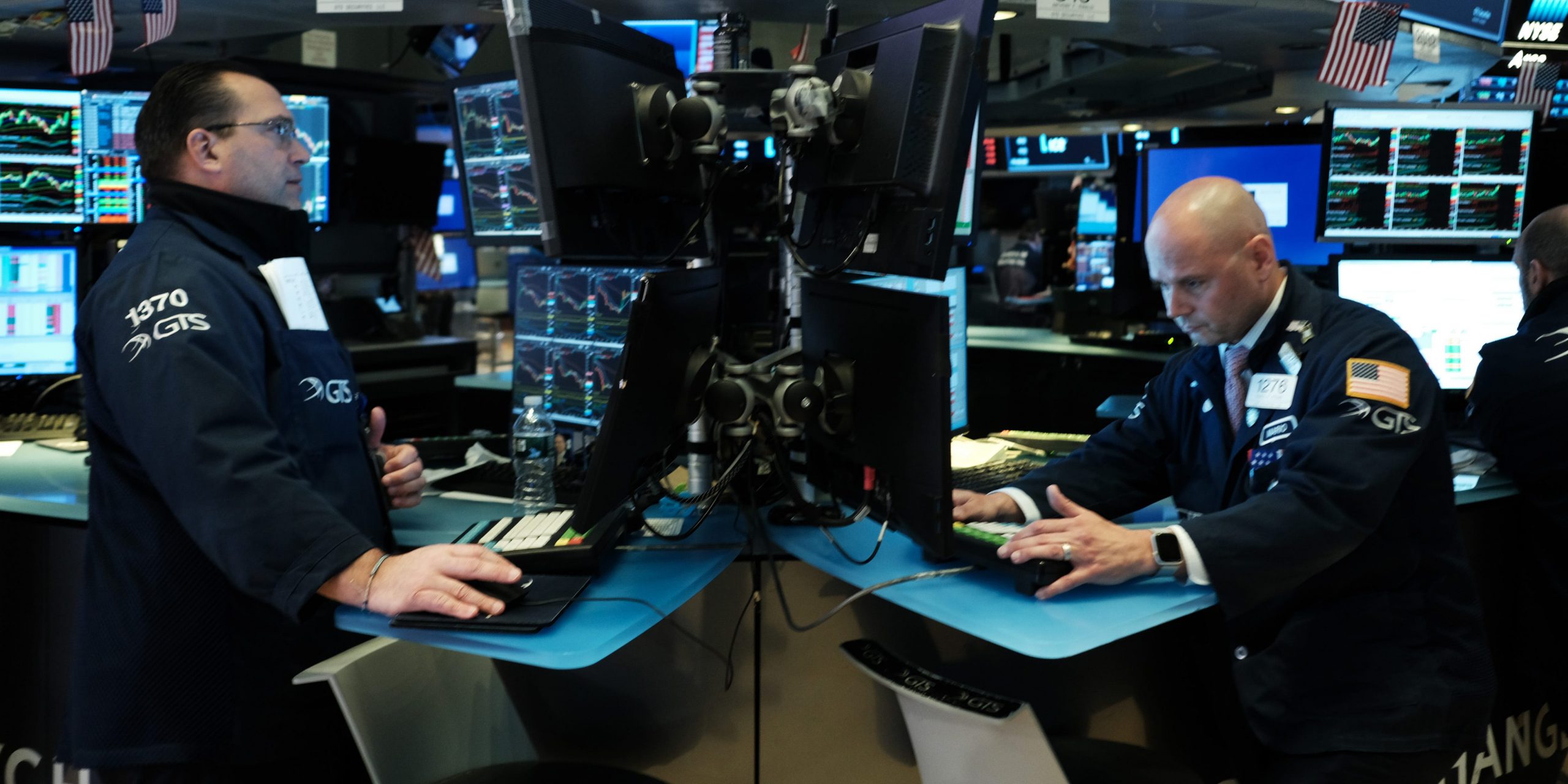 Traders work on the floor of the New York Stock Exchange (NYSE) on March 18, 2020 in New York City. The Dow fell more than 1,200 points today as COVID-19 fears continue to roil world markets. (