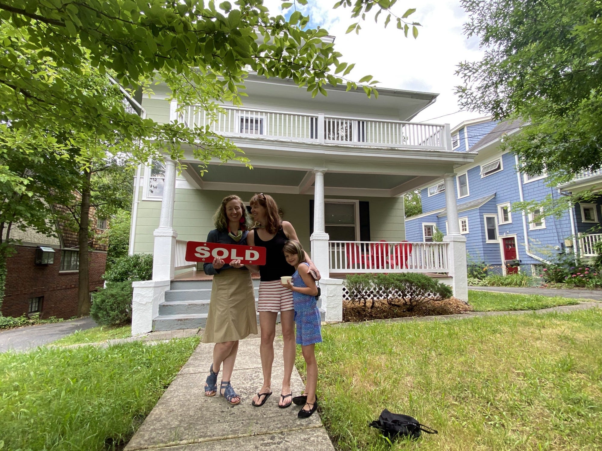 On closing day (from left, Herrin Hopper, Holly Harper, Madeline Harper)