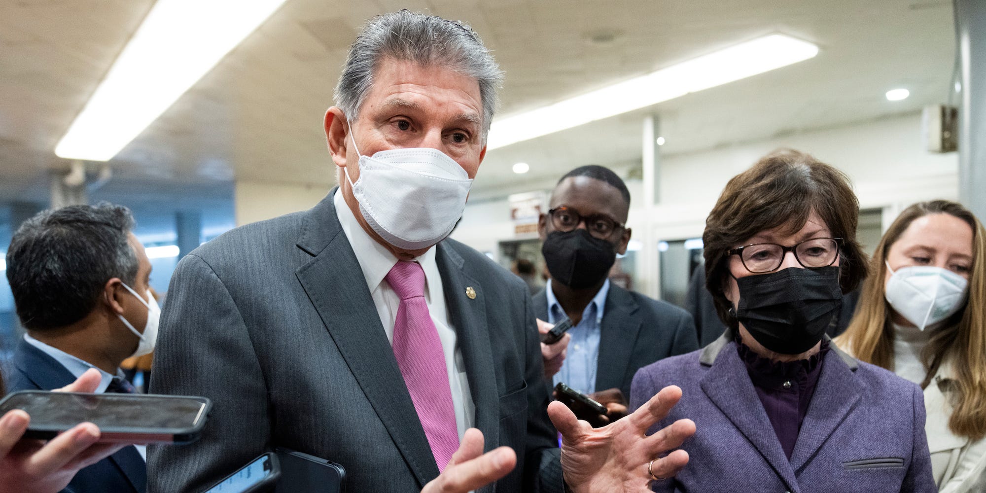 Sens. Joe Manchin, D-W.Va., and Susan Collins, R-Maine, talk with reporters about voting rights in the U.S. Capitol on Thursday, January 20, 2022