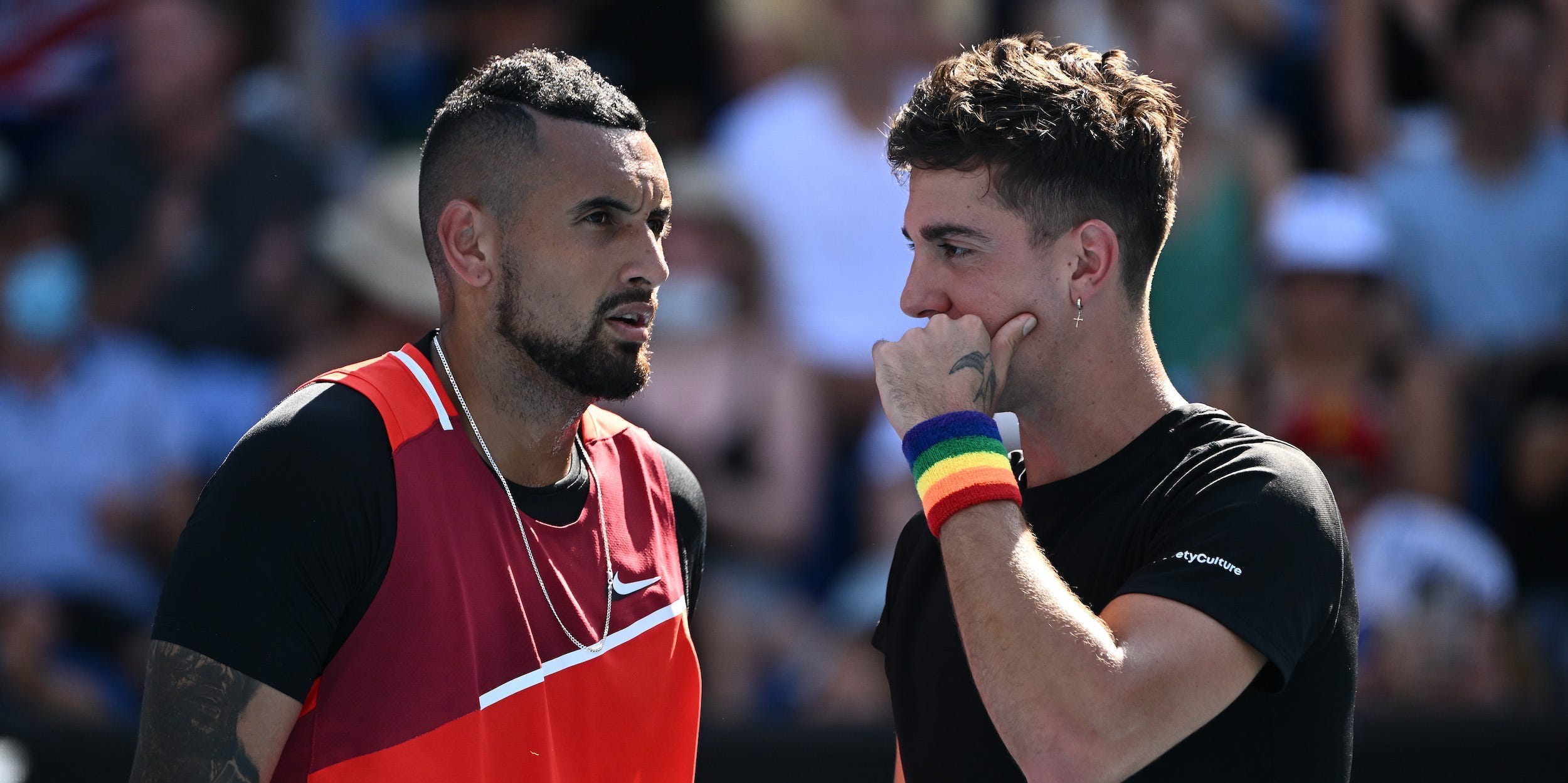 Nick Kyrgios and doubles partner Thanasi Kokkinakis during the third round of the doubles competition at the 2022 Australian Open.