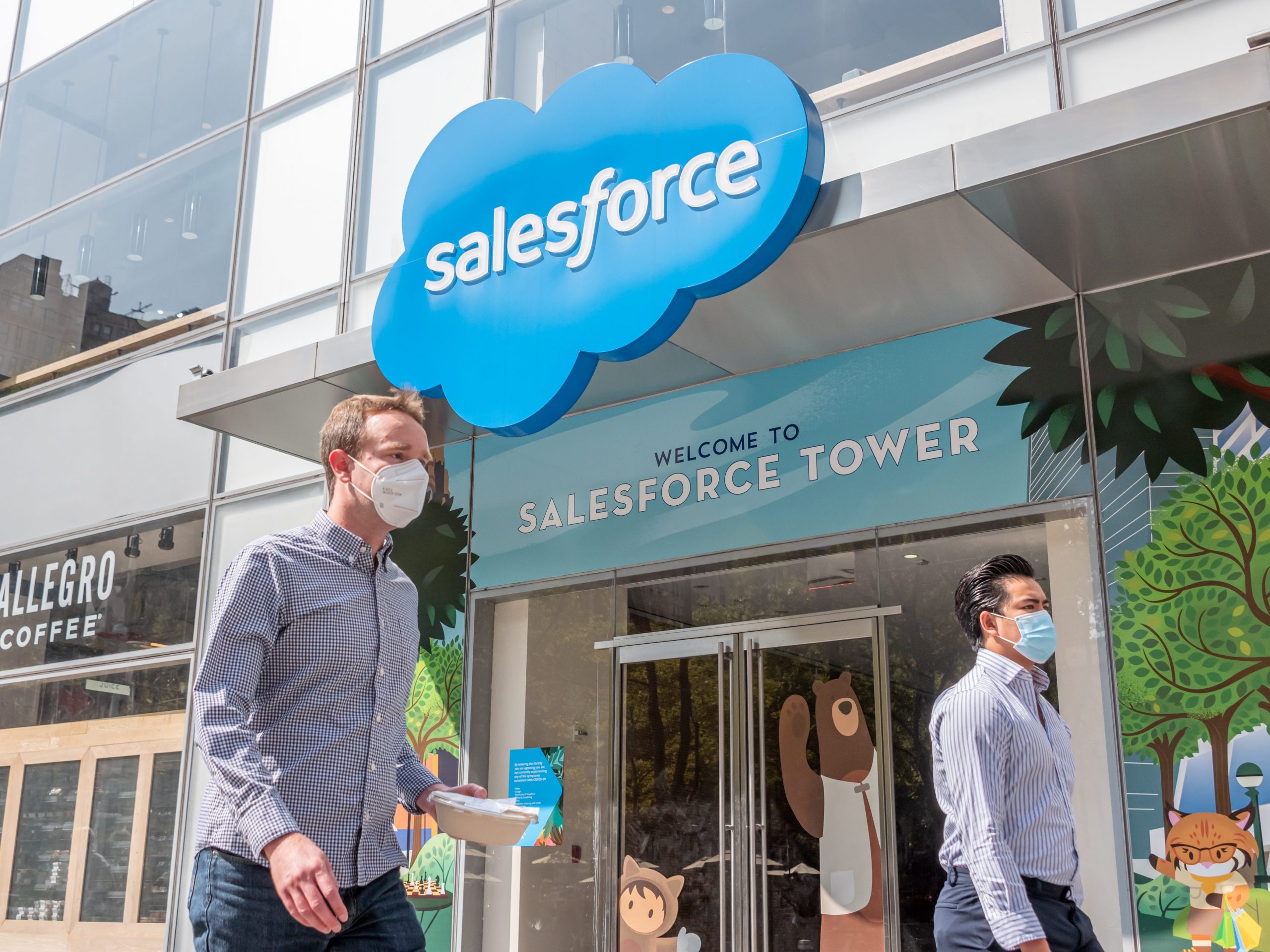 Workers wear protective face masks outside Salesforce Tower as the city continues Phase 4 of re-opening following restrictions imposed to slow the spread of coronavirus on September 22, 2020 in New York City.