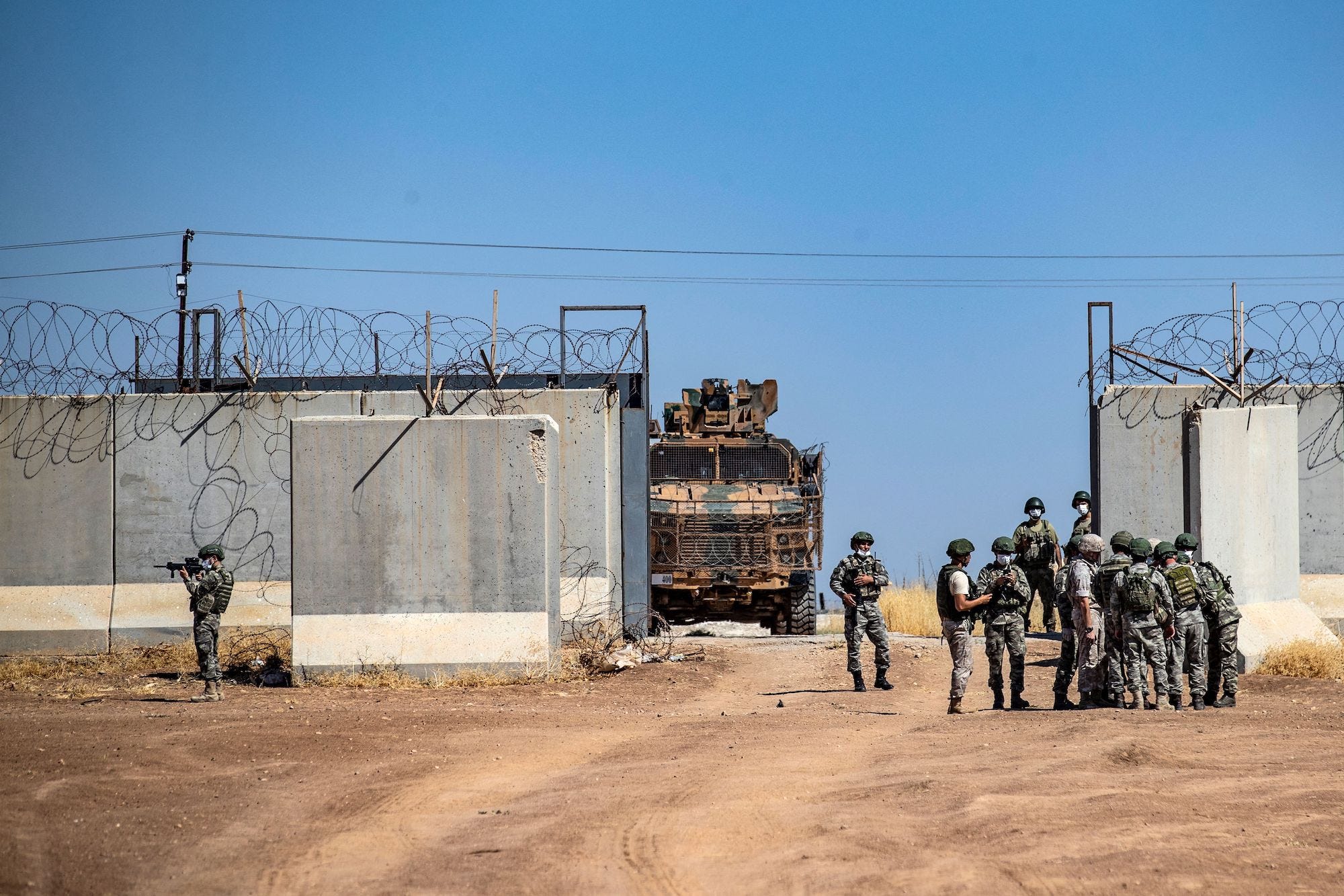 Russia Turkey troops soldiers patrol in Syria