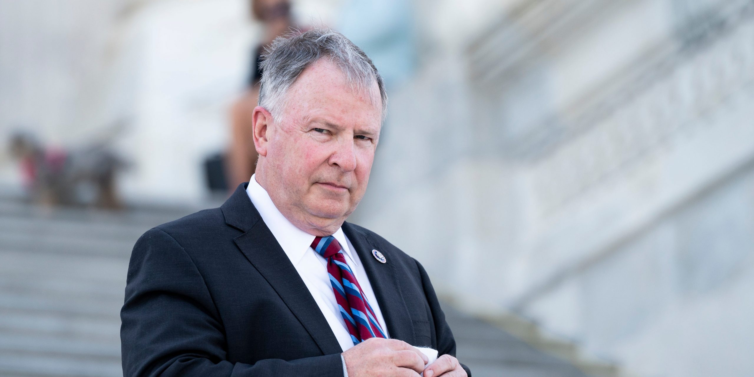 Rep. Doug Lamborn walks down the House steps of the Capitol after a vote on April 20, 2021.