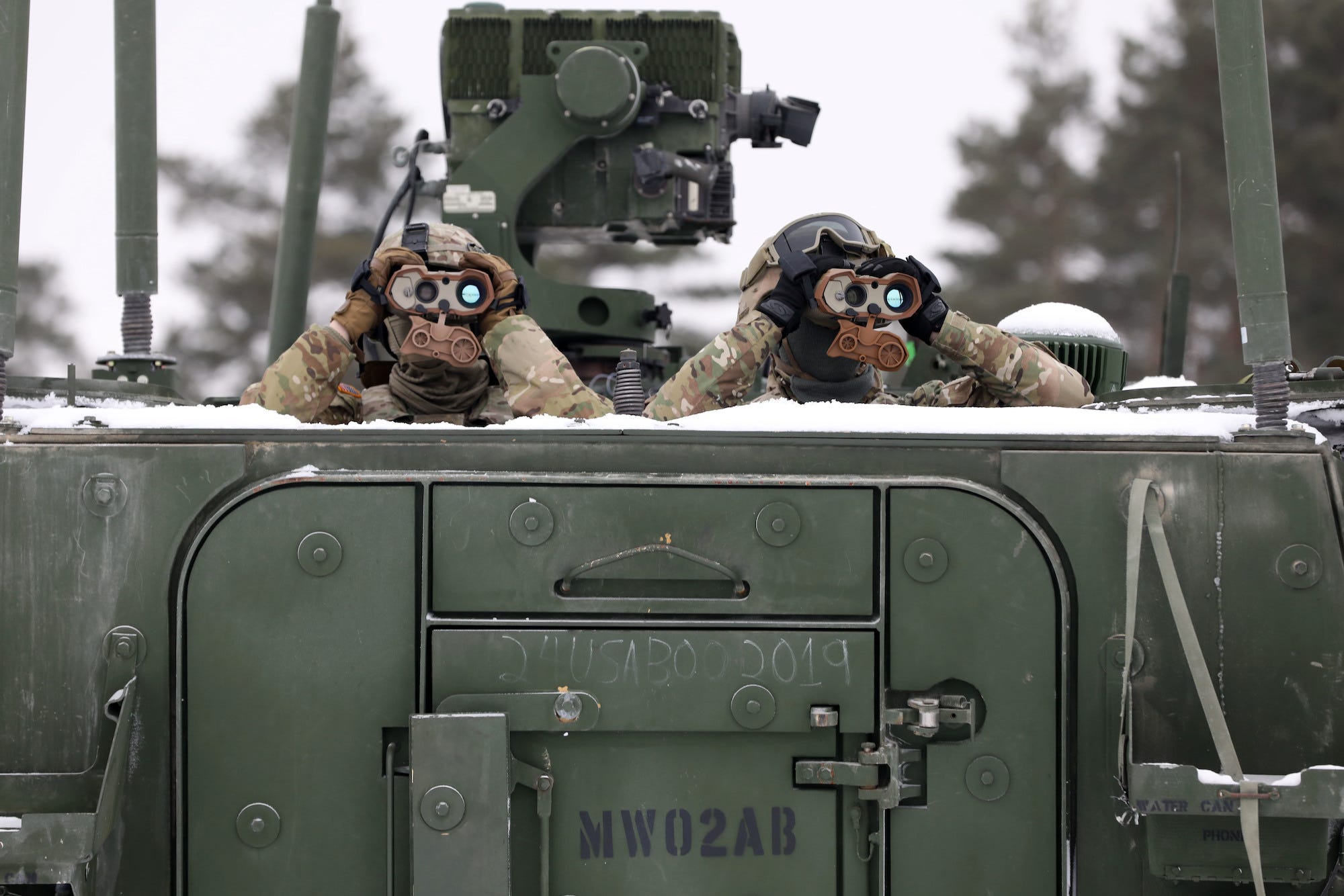 US soldiers with binoculars during NATO exercise