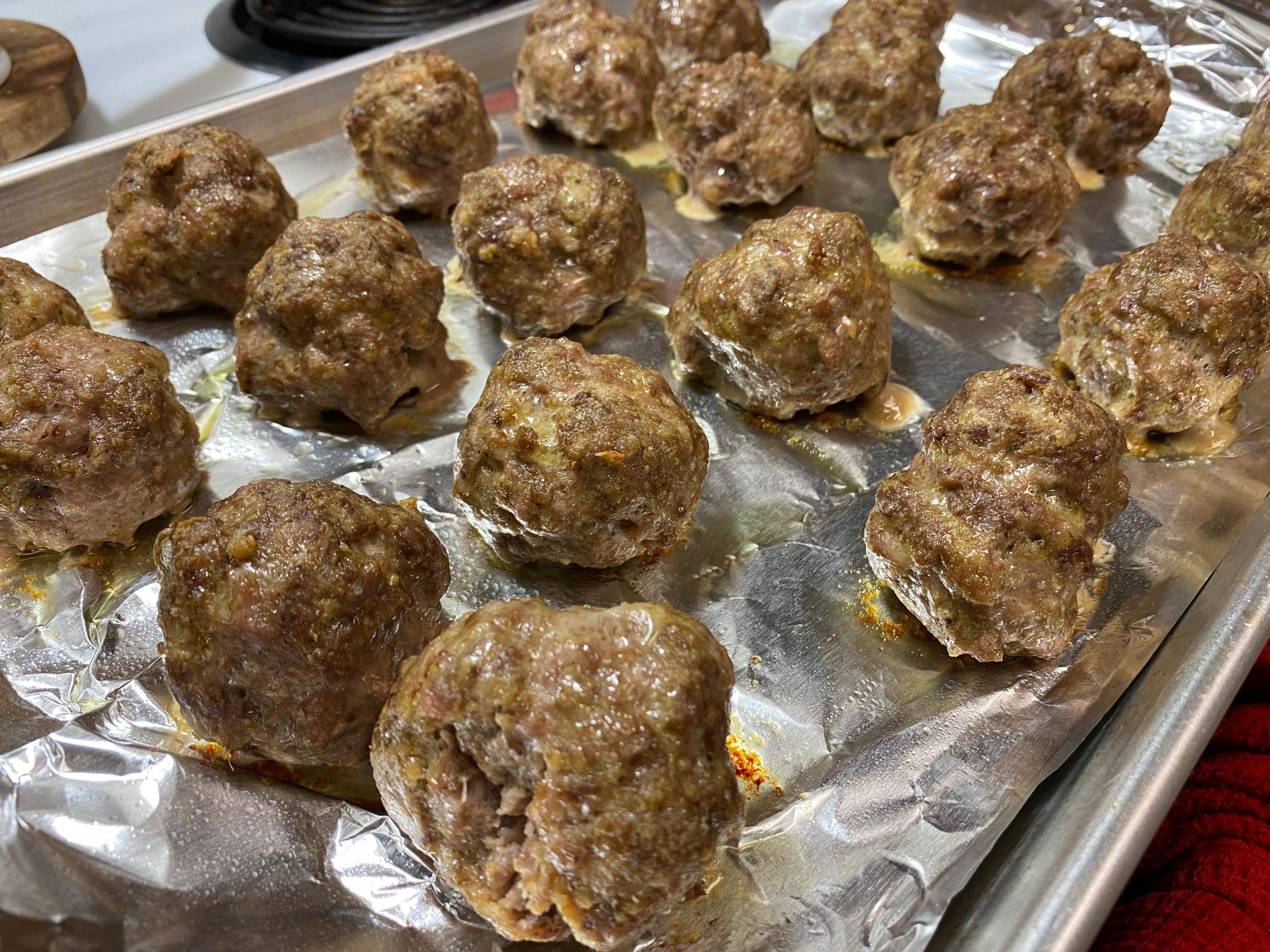 Meatballs on a foil-lined tray