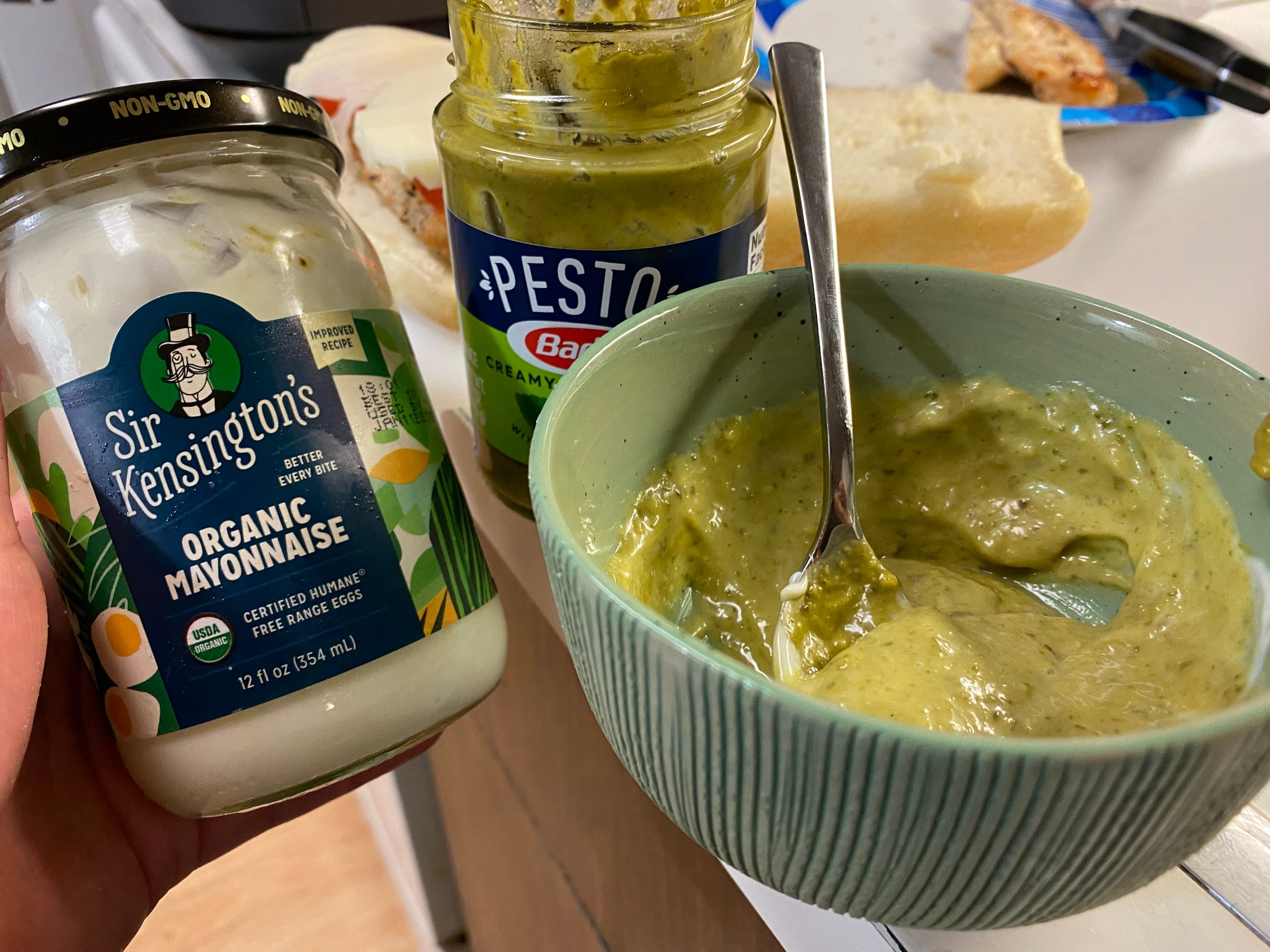 pesto and mayo mixed together in a bowl