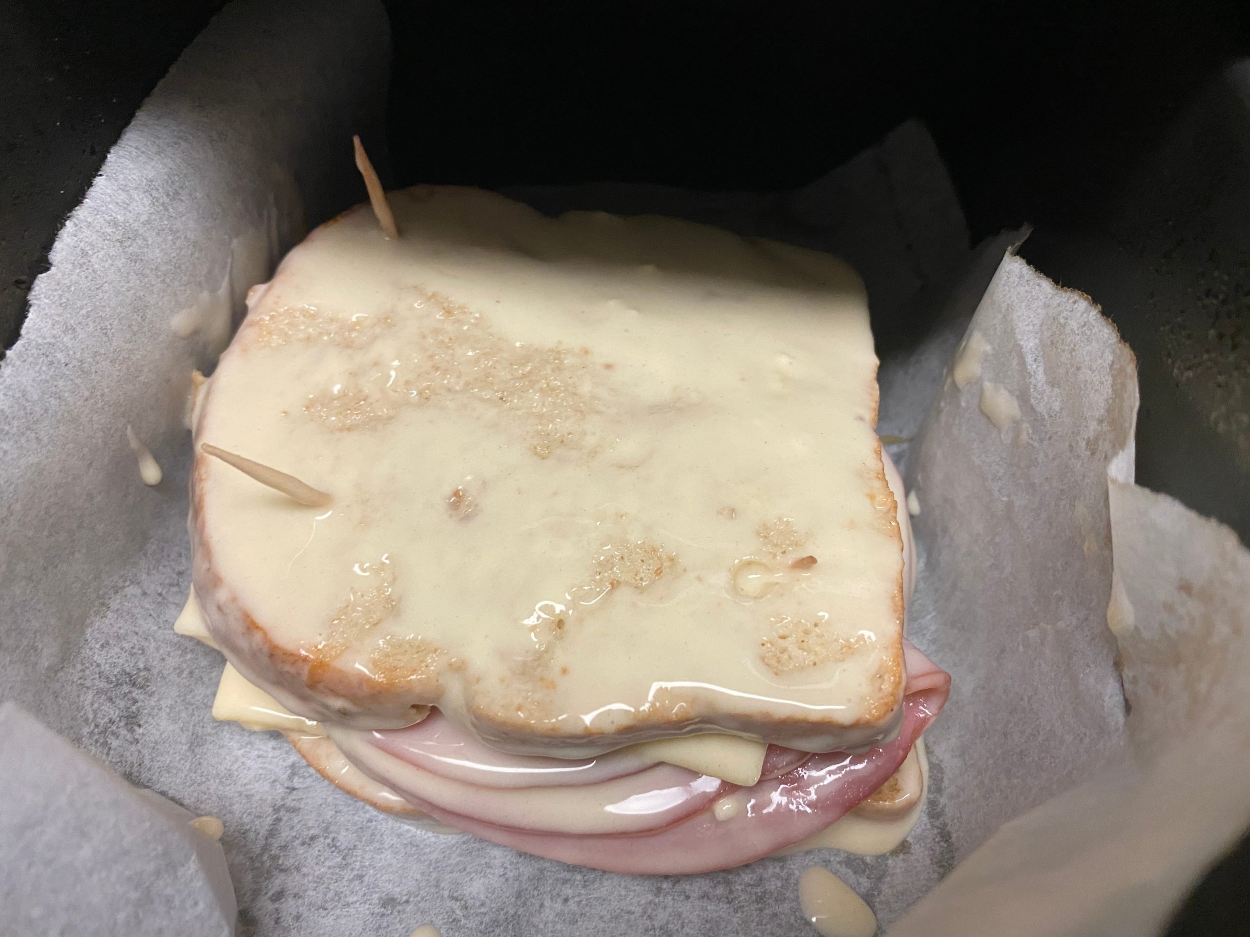 parchment-lined paper with the Monte Cristo on top