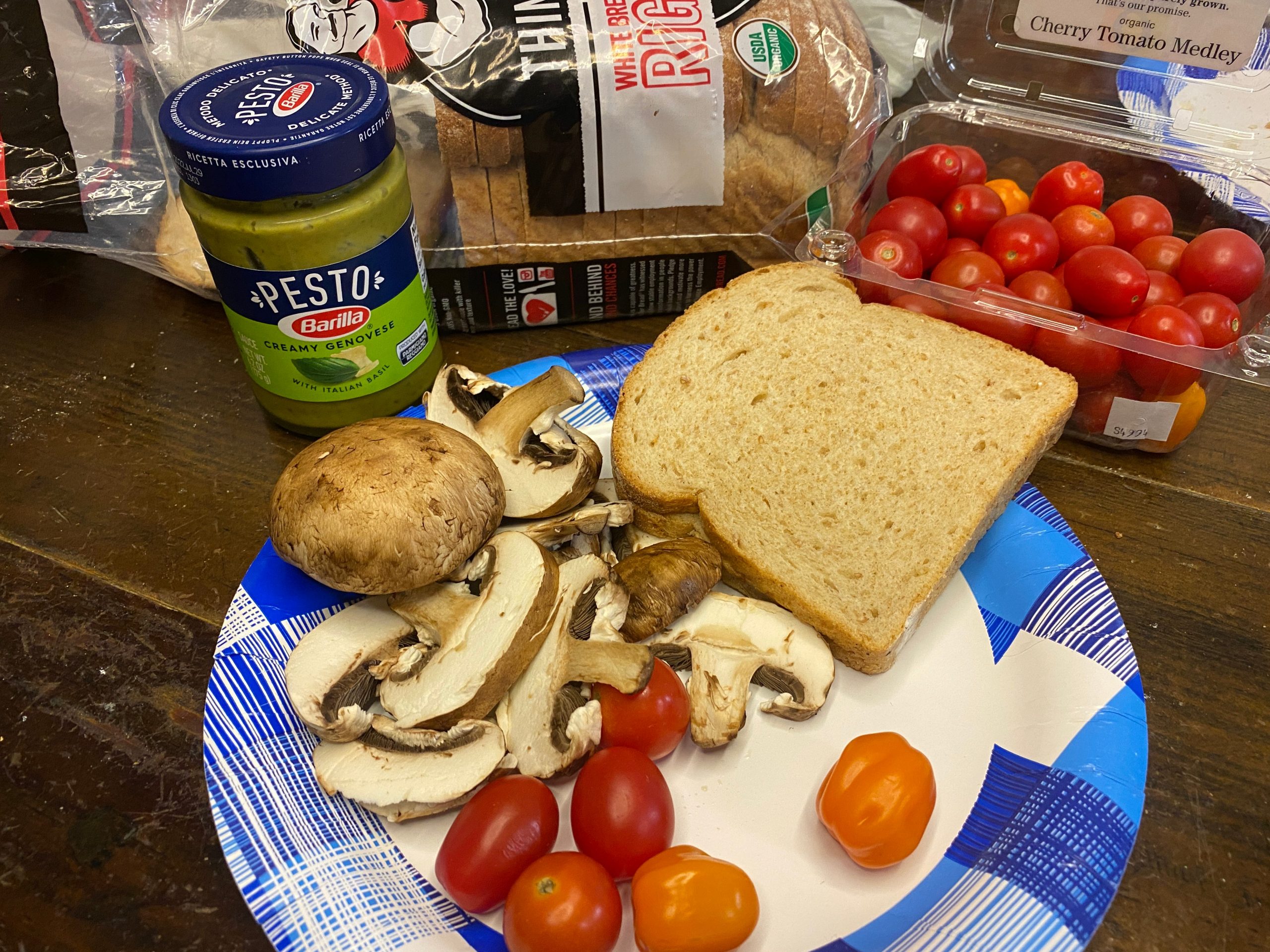 pesto, mushrooms, cherry tomatoes, and bread