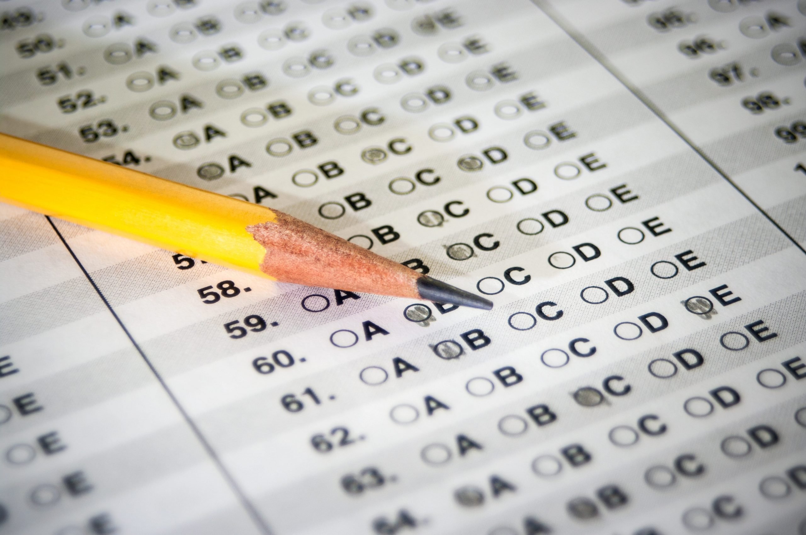 A No. 2 pencil with colored in boxes on a Scantron test.