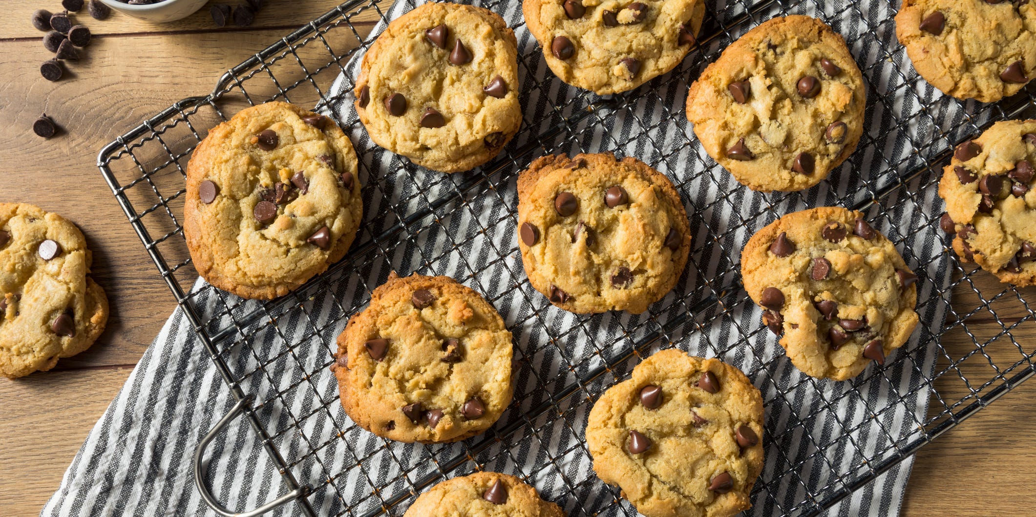 A high-angle view of chocolate chip cookies on a cooling rack