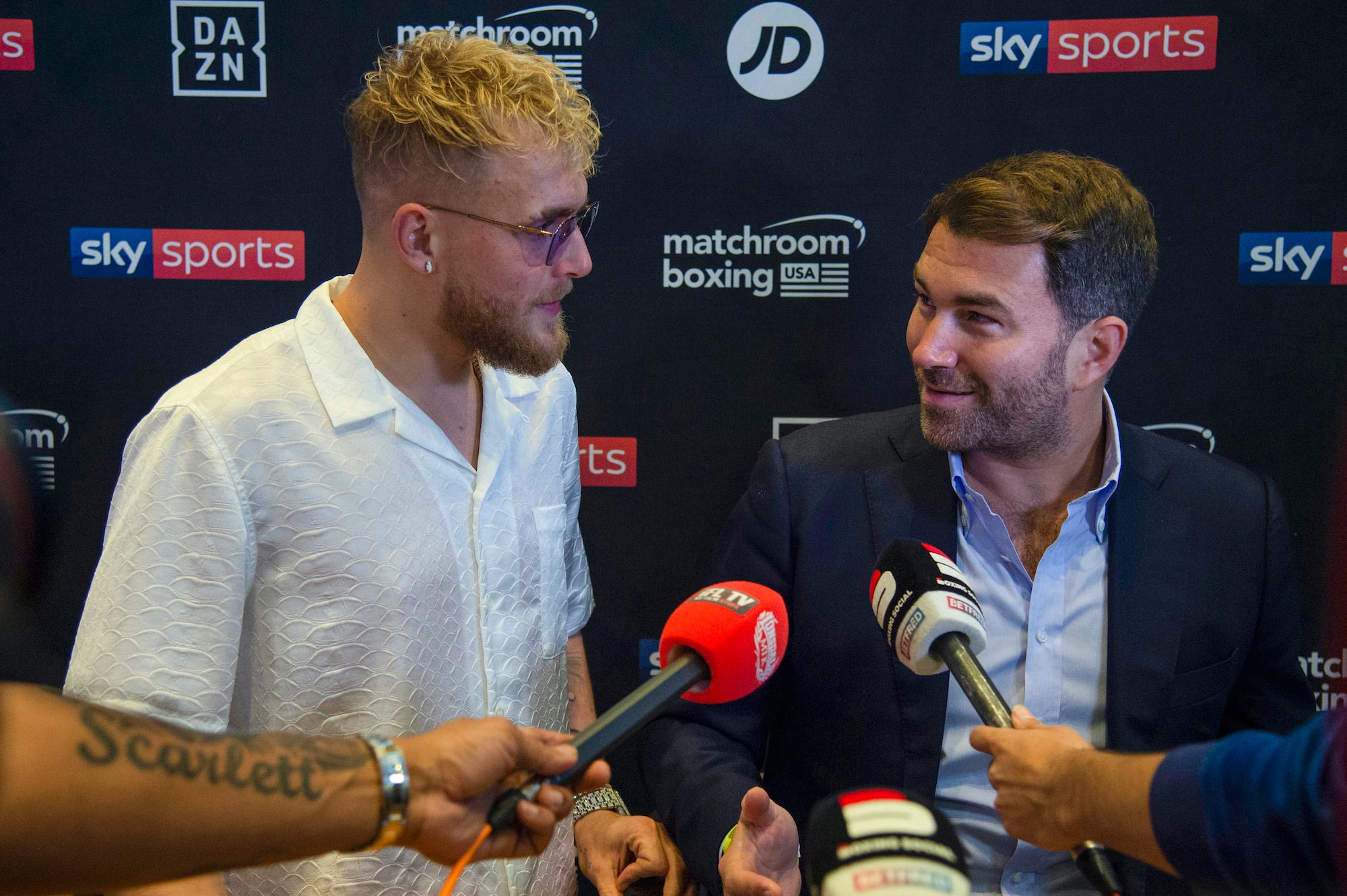 Jake Paul and Eddie Hearn.