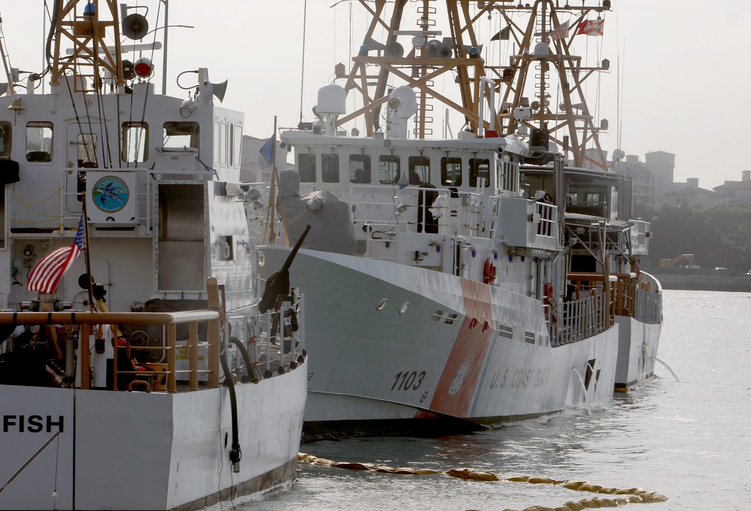 United States Coast Guard Cutters are moored to the dock at the Coast Guard Sector Miami base on January 26, 2022 in Miami, Florida. The United States Coast Guard continues search and rescue operations for survivors after a boat believed to be involved in a human smuggling operation capsized off the Florida coast. U.S. Coast Guard Section Miami Commander Captain Jo-Ann F Burdian said during a press conference held at the base that at least one person is dead, and dozens more are missing.