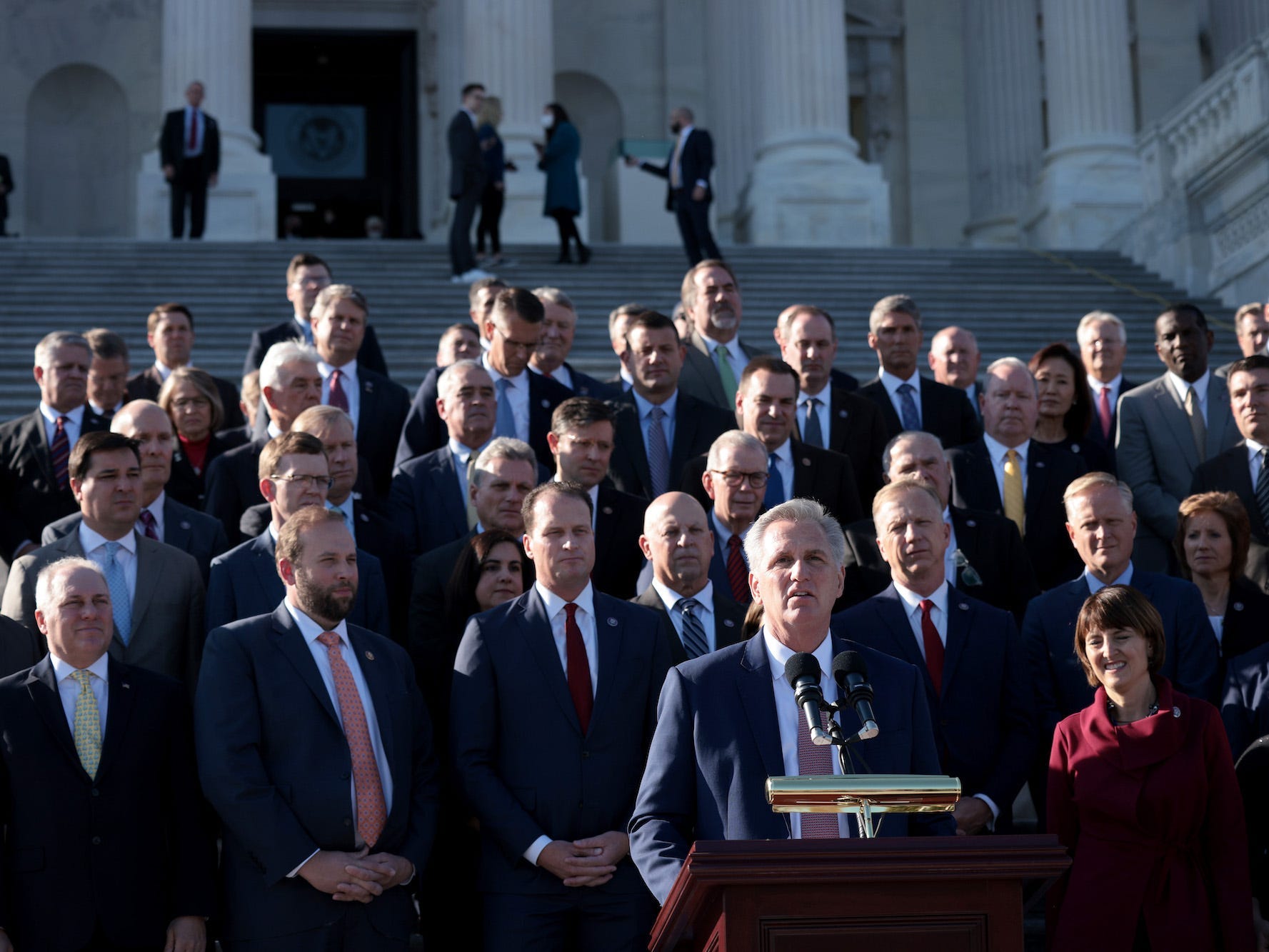 House Minority Leader Kevin McCarthy speaks with fellow Republicans on the House steps as the House debates censuring Rep. Paul Gosar on November 17, 2021 in Washington, DC.