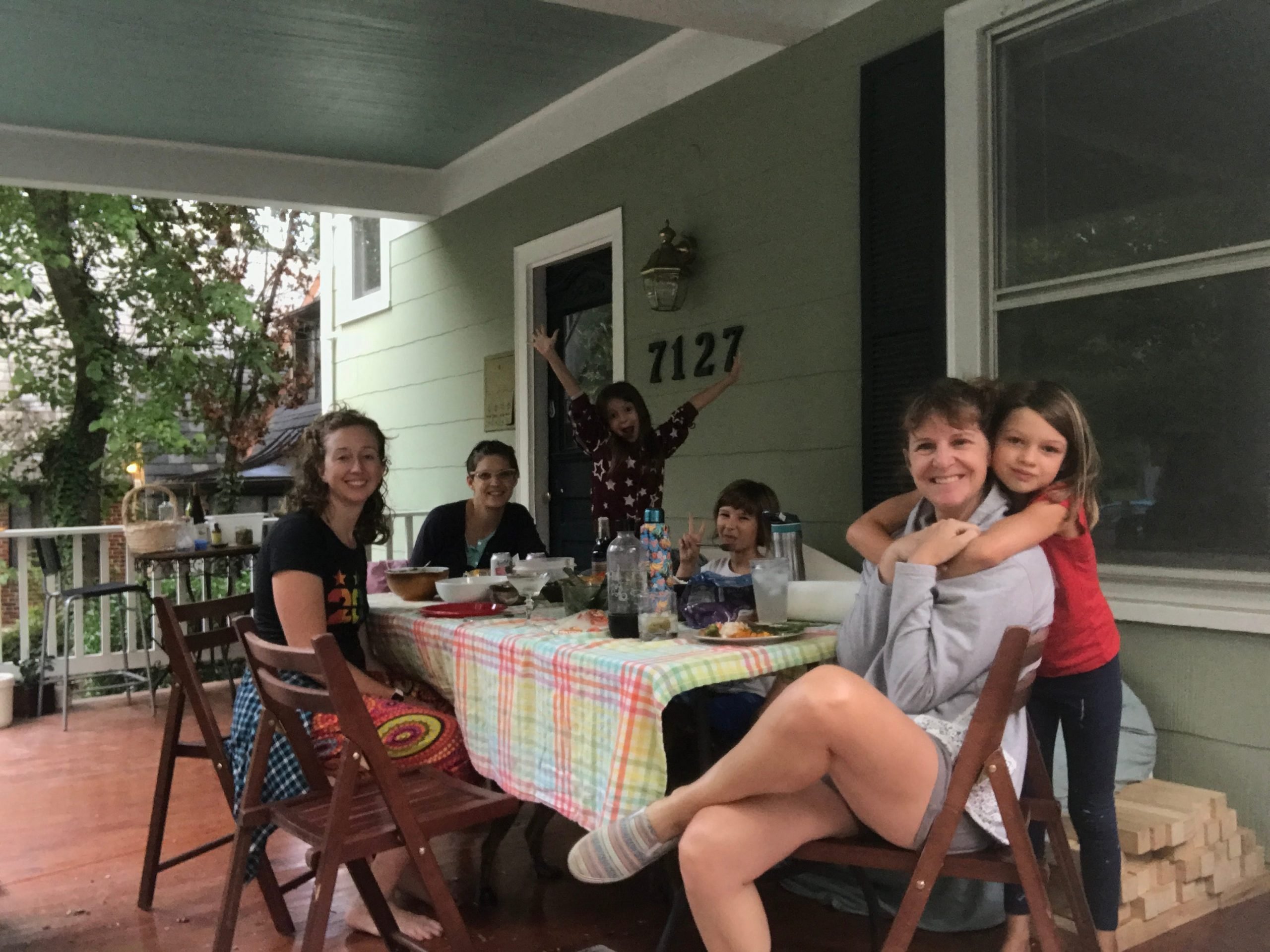 Holly Harper dining outside her house