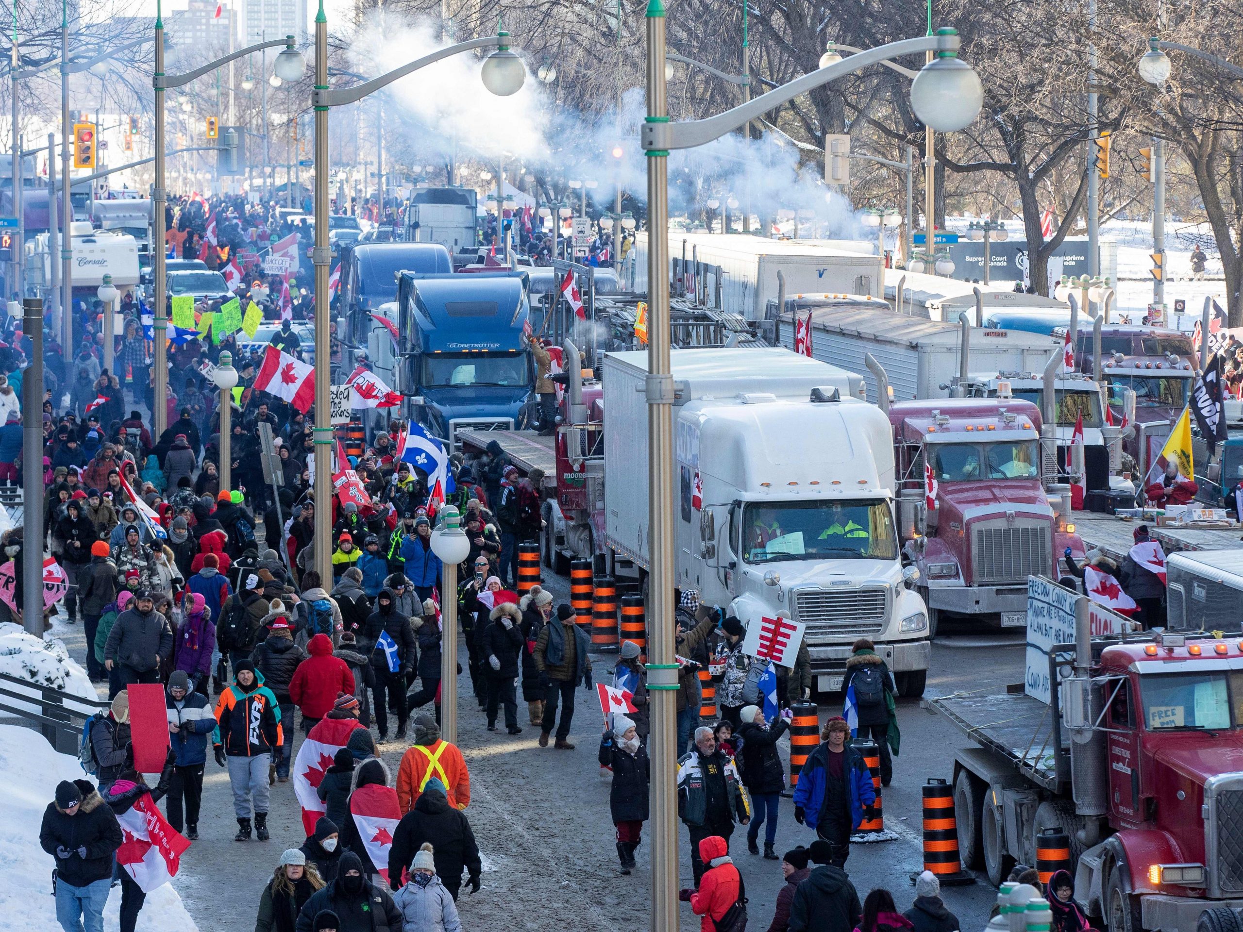 Supporters and trucks fill the street at Parliament Hill for the Freedom Truck Convoy to protest against Covid-19 vaccine mandates and restrictions in Ottawa, Canada, on January 29, 2022.