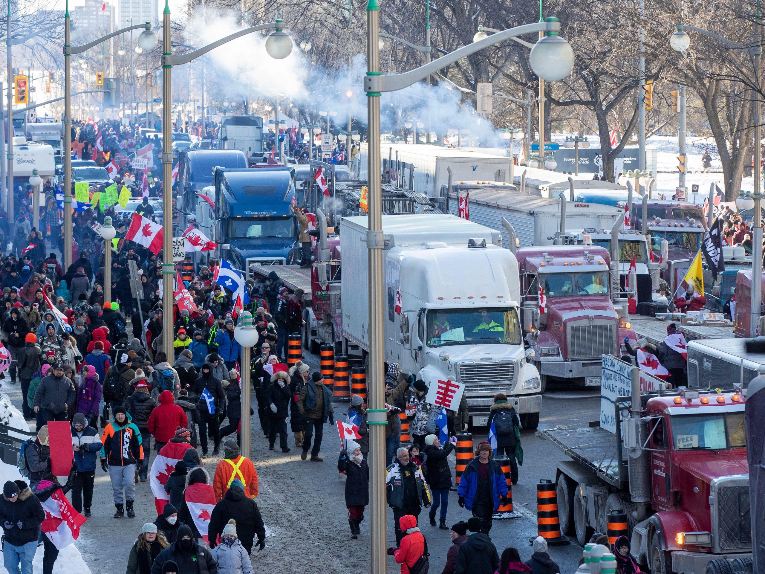 Supporters and trucks fill the street at Parliament Hill for the Freedom Truck Convoy to protest against Covid-19 vaccine mandates and restrictions in Ottawa, Canada, on January 29, 2022.