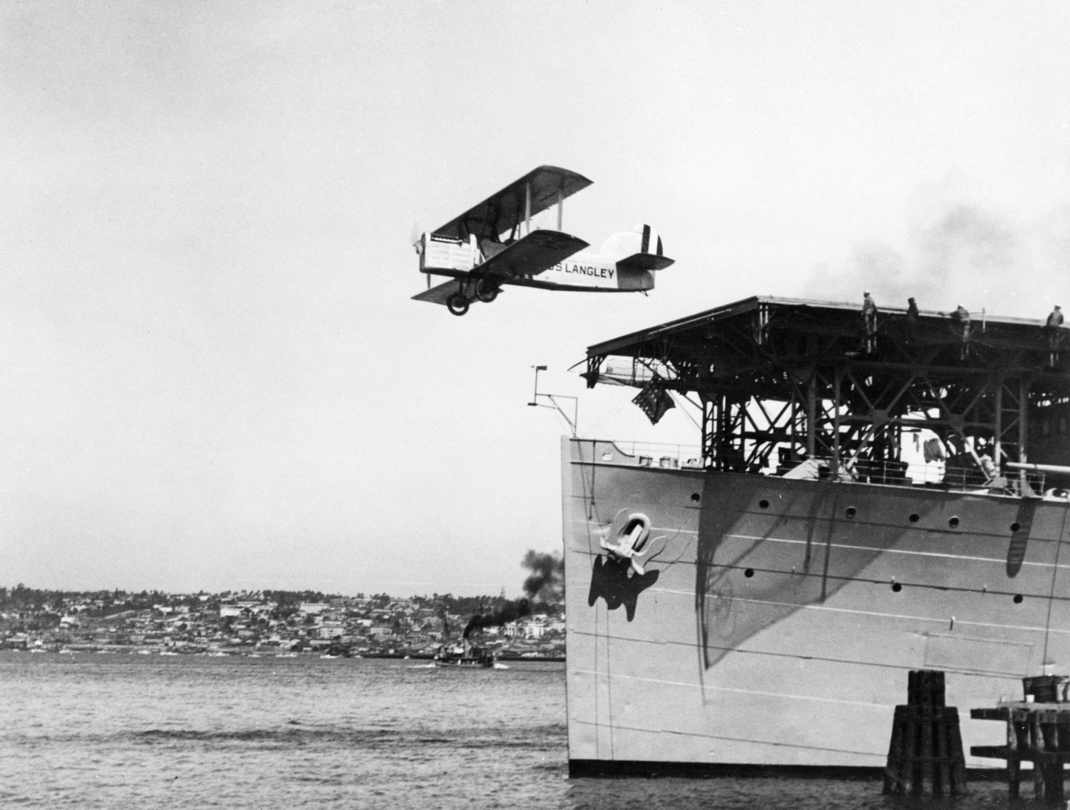 Navy USS Langley aircraft carrier takeoff