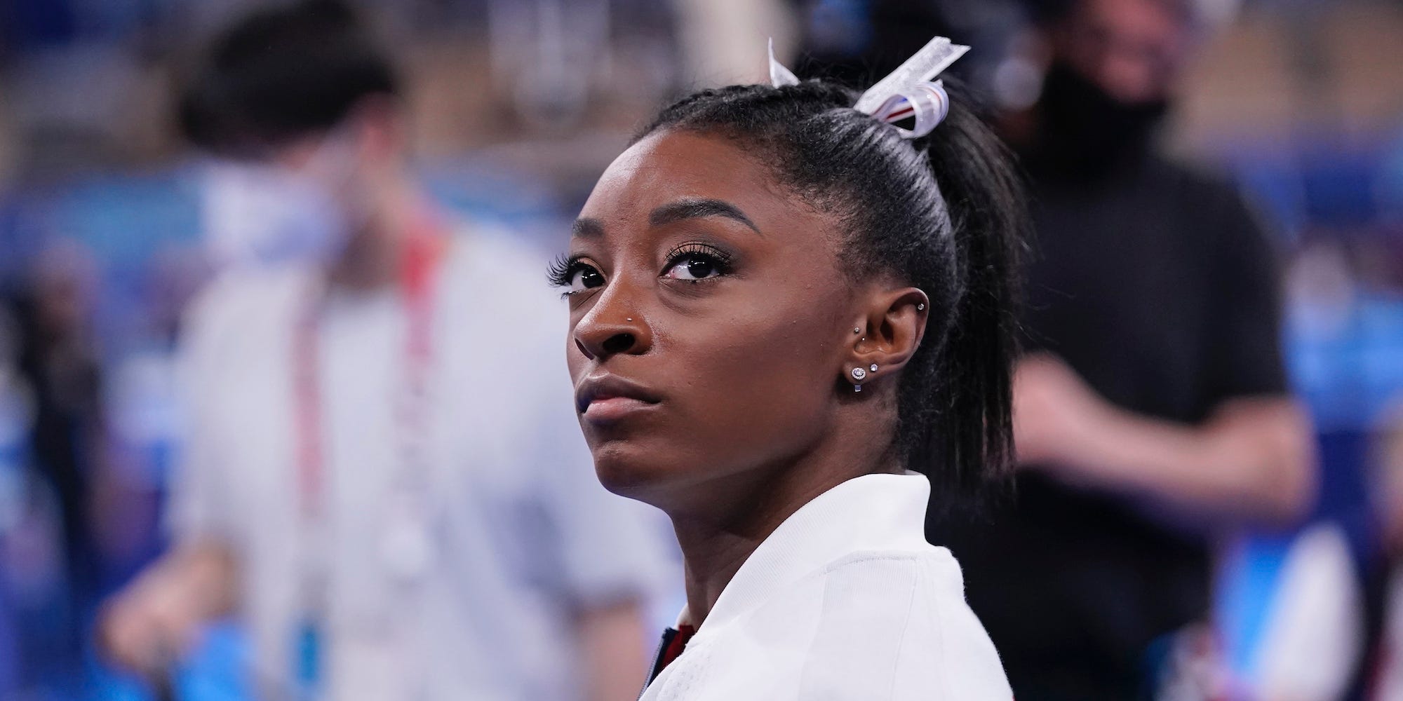 Simone Biles looks on during the Tokyo Olympics.