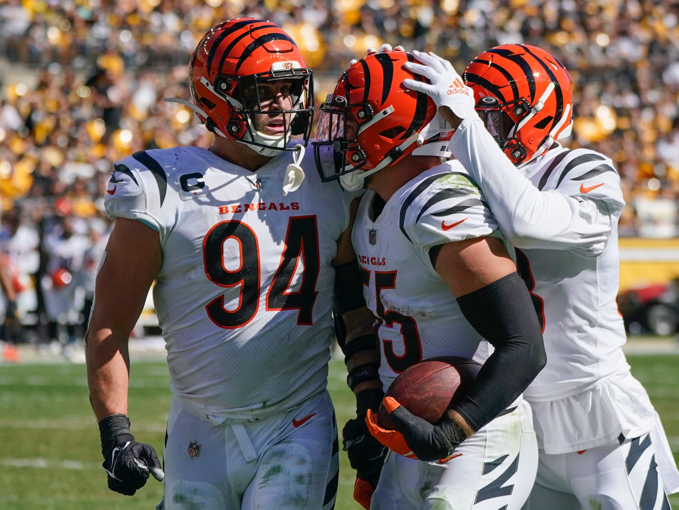 Cincinnati Bengals defense celebrates an interception against the Steelers.