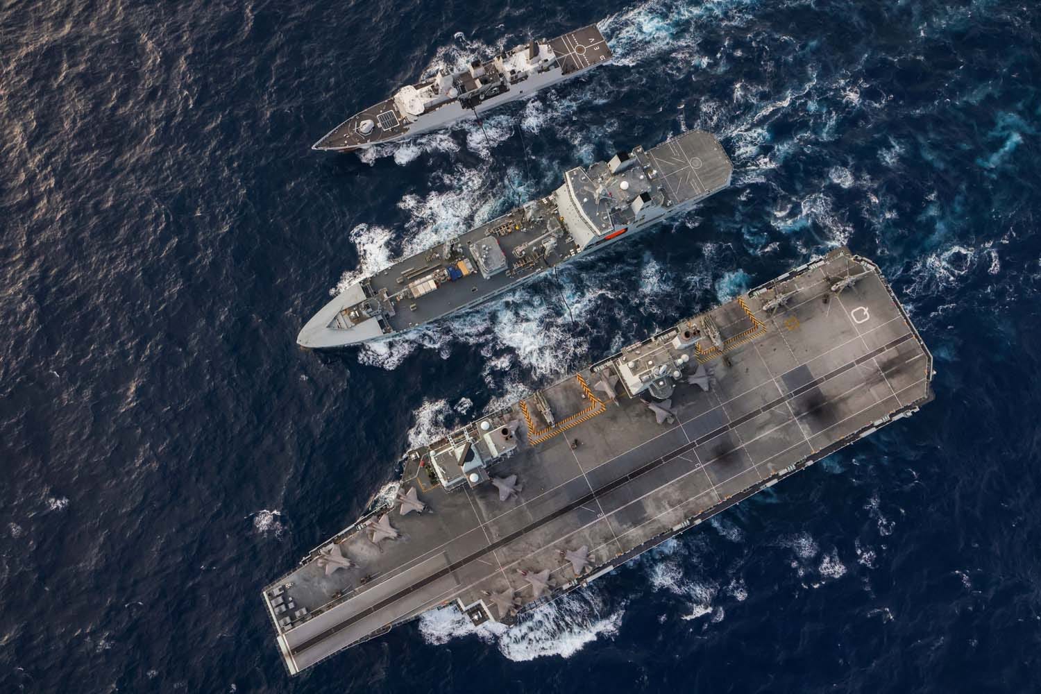 RFA Tidespring replenishment at sea with HMS Queen Elizabeth HNLMS Evertsen