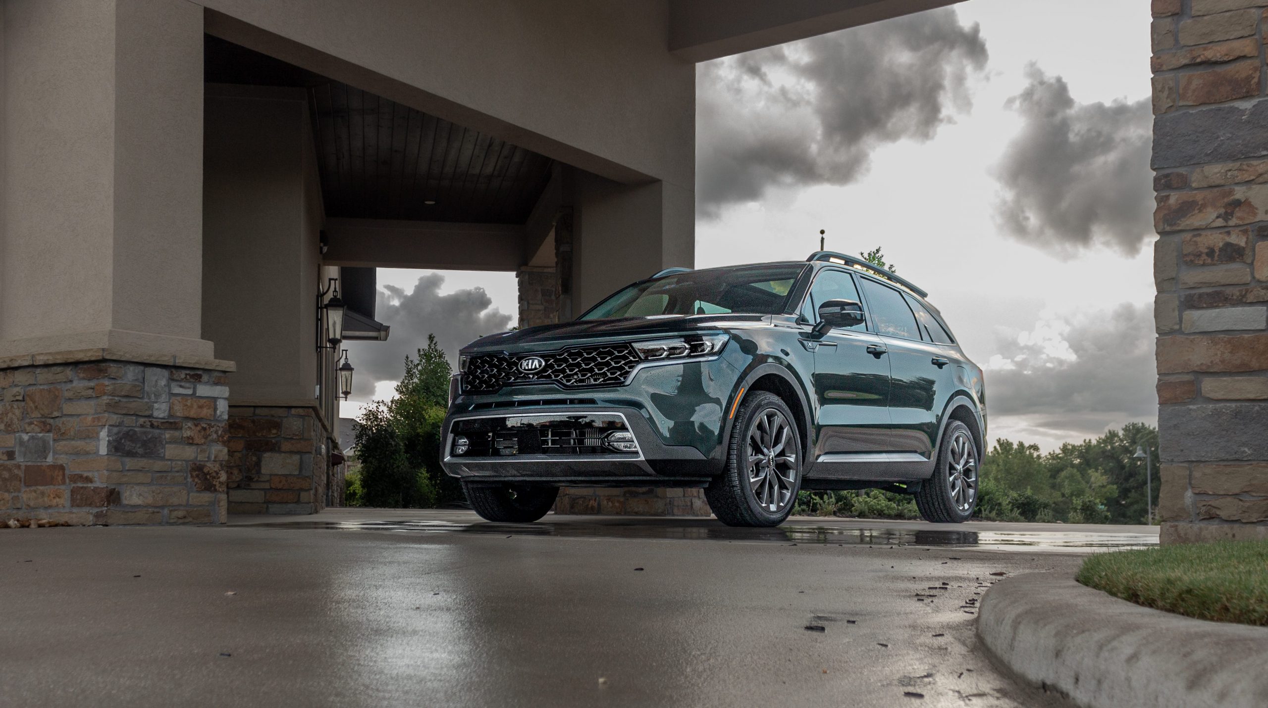 A slate green Kia Sorento X-Line.