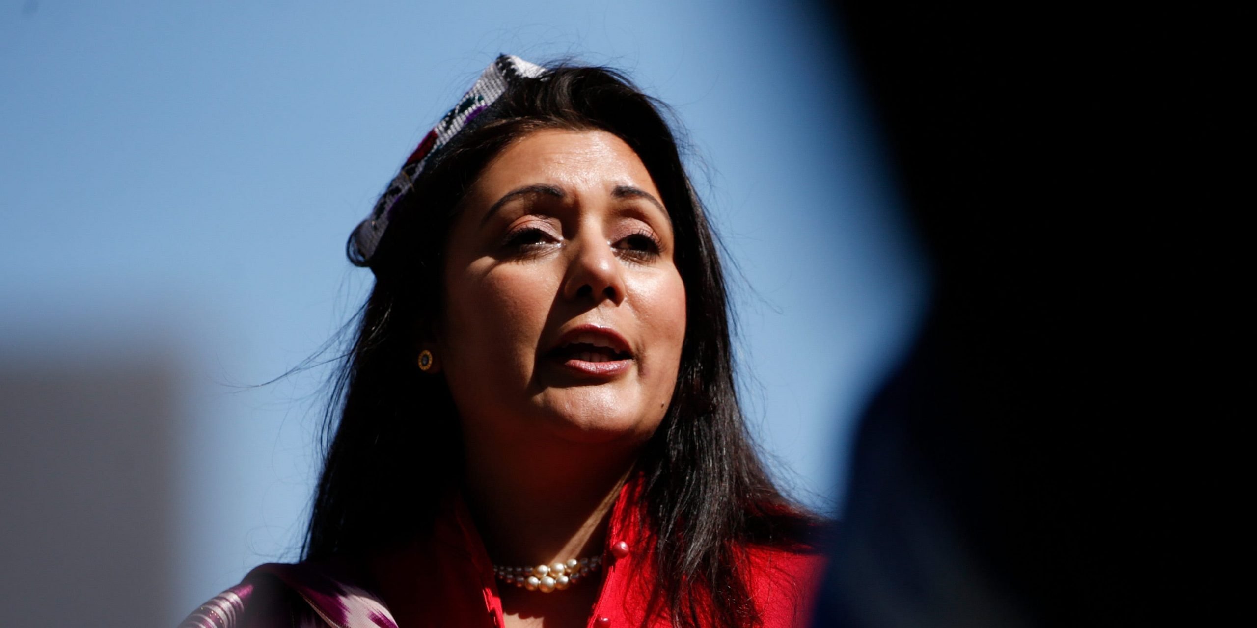 Conservative Party MP Nusrat Ghani addresses members of the Uighur community and human rights activists demonstrating outside the Houses of Parliament in London, United Kingdom on April 22, 2021