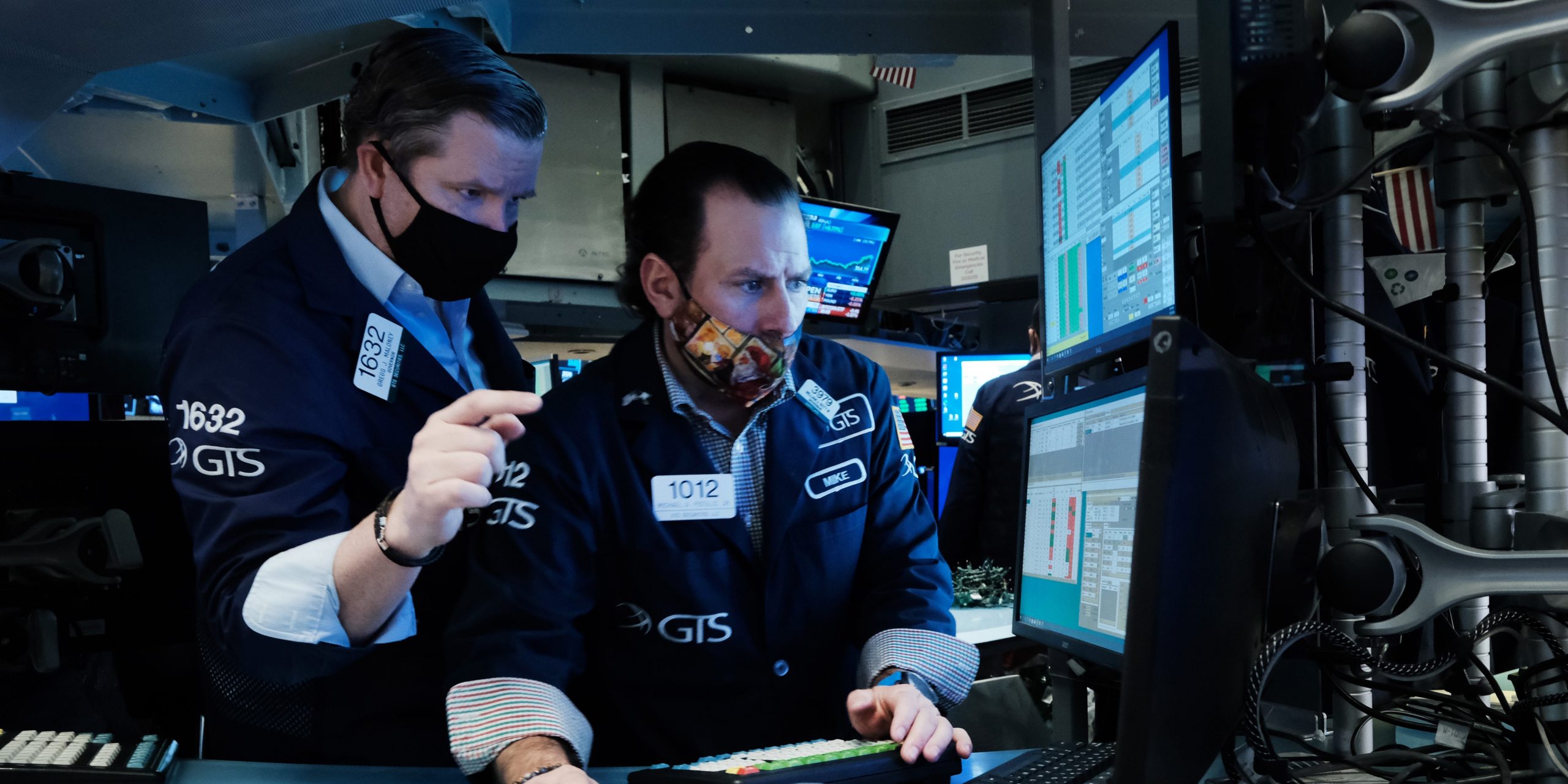 A trader works on the floor of the New York Stock Exchange at the start of trading on Monday following Friday’s steep decline in global stocks over fears of the new omicron Covid variant on December 20, 2021 in New York City.