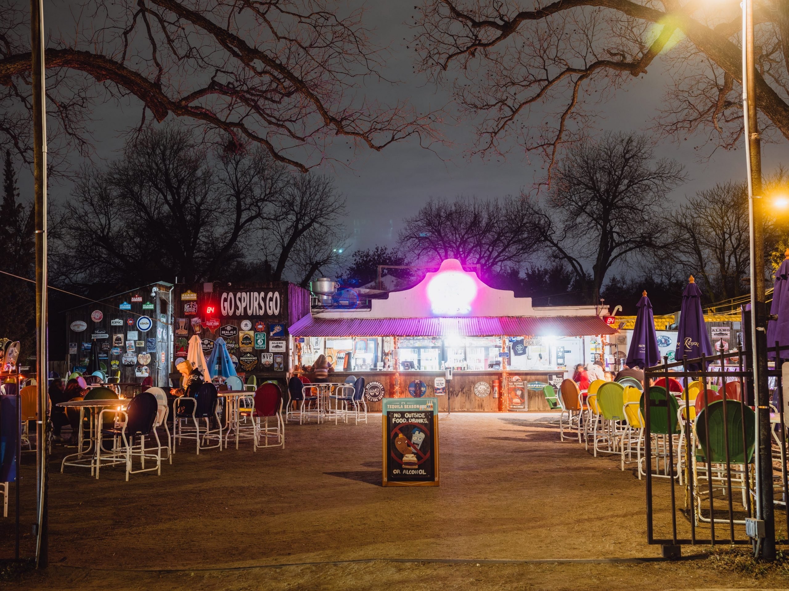 An outdoor bar at night.