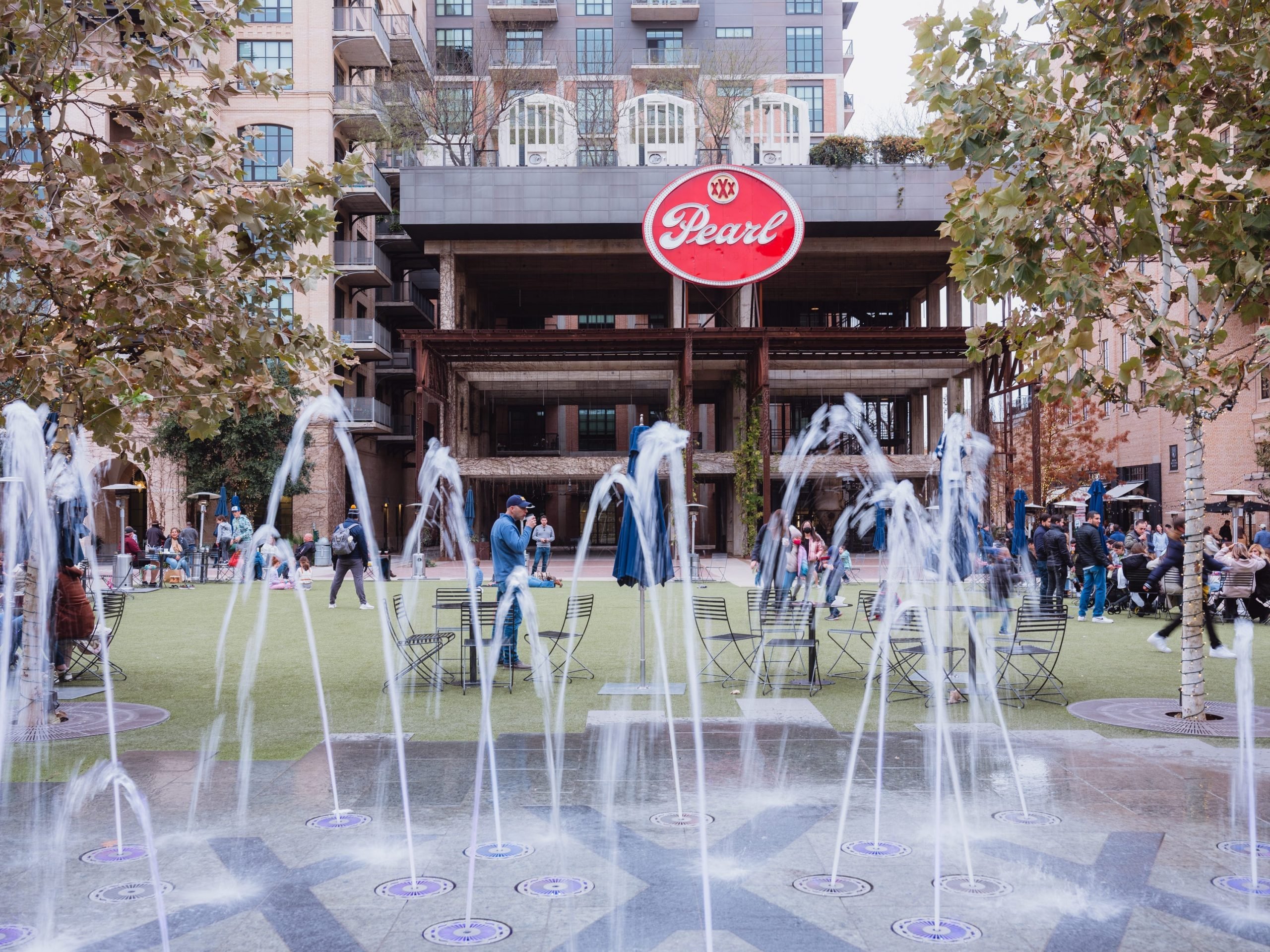 A water fountain in an outdoor plaza.