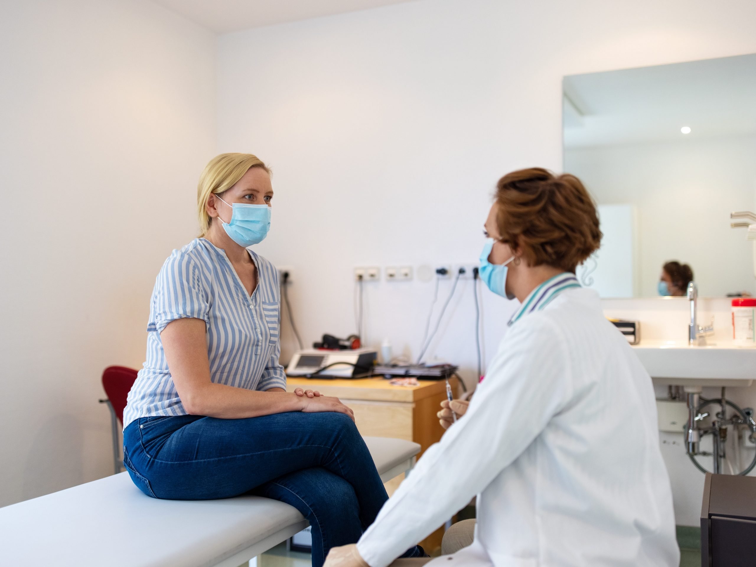 Woman with their doctor